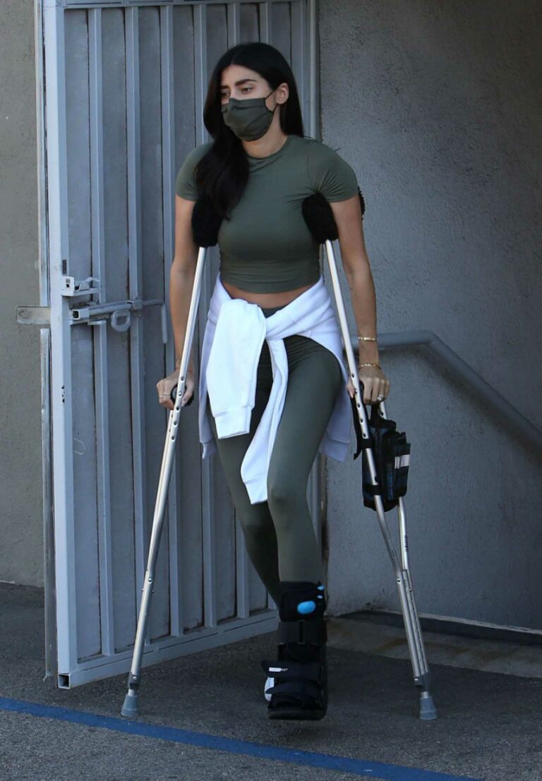 Nicole Williams in an Olive Workout Ensemble