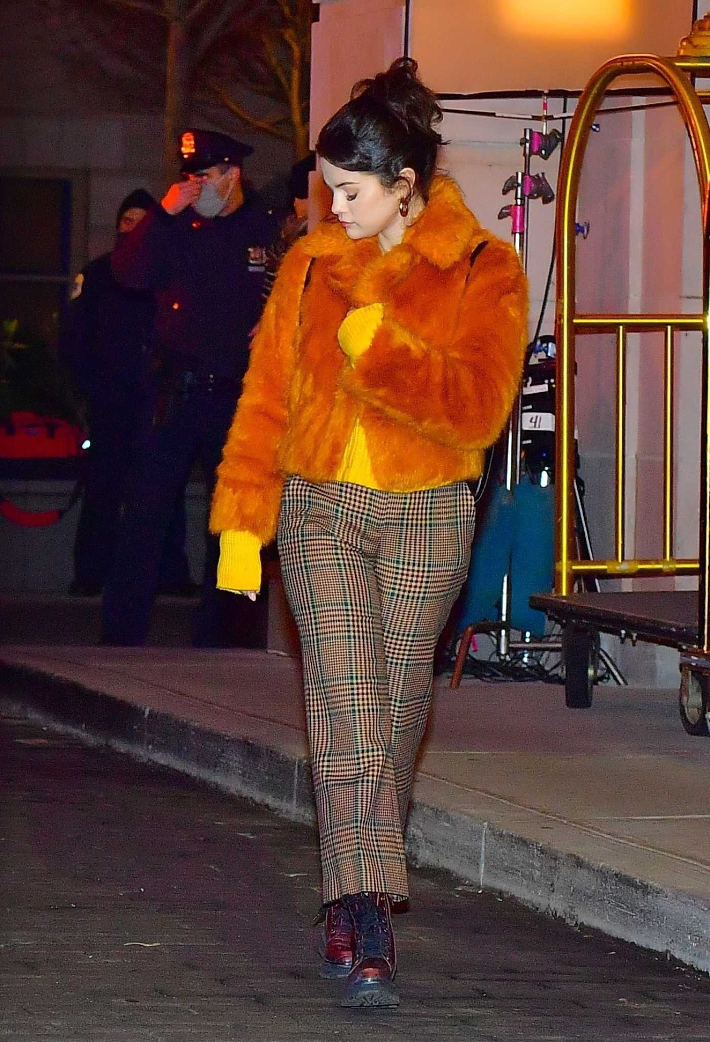 Selena Gomez in an Orange Fur Coat on the Set of Only Murders In the Building in New York 01/17/2021