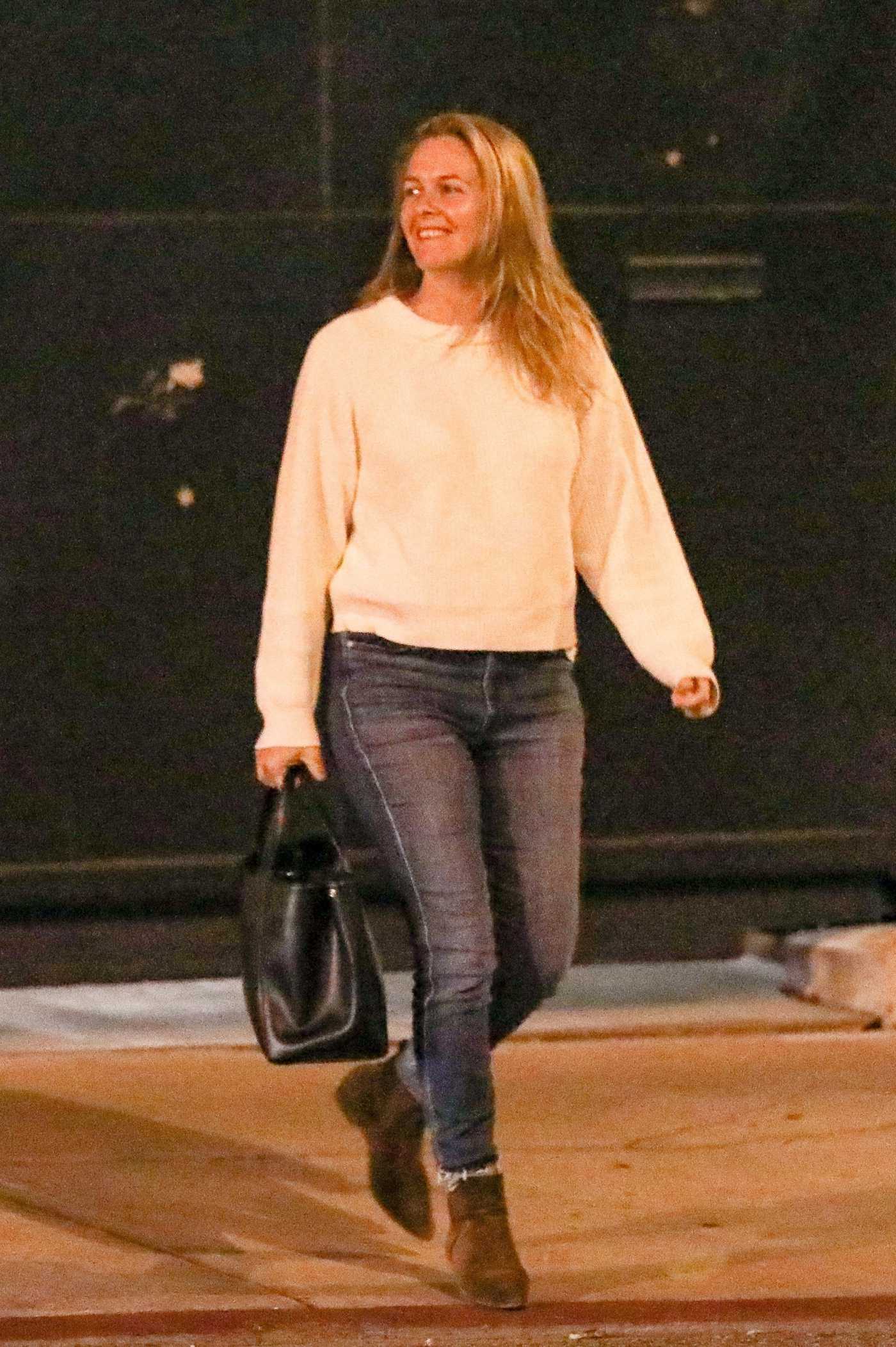 Alicia Silverstone in a White Sweatshirt Leaves a Hair Salon West Hollywood 02/19/2021