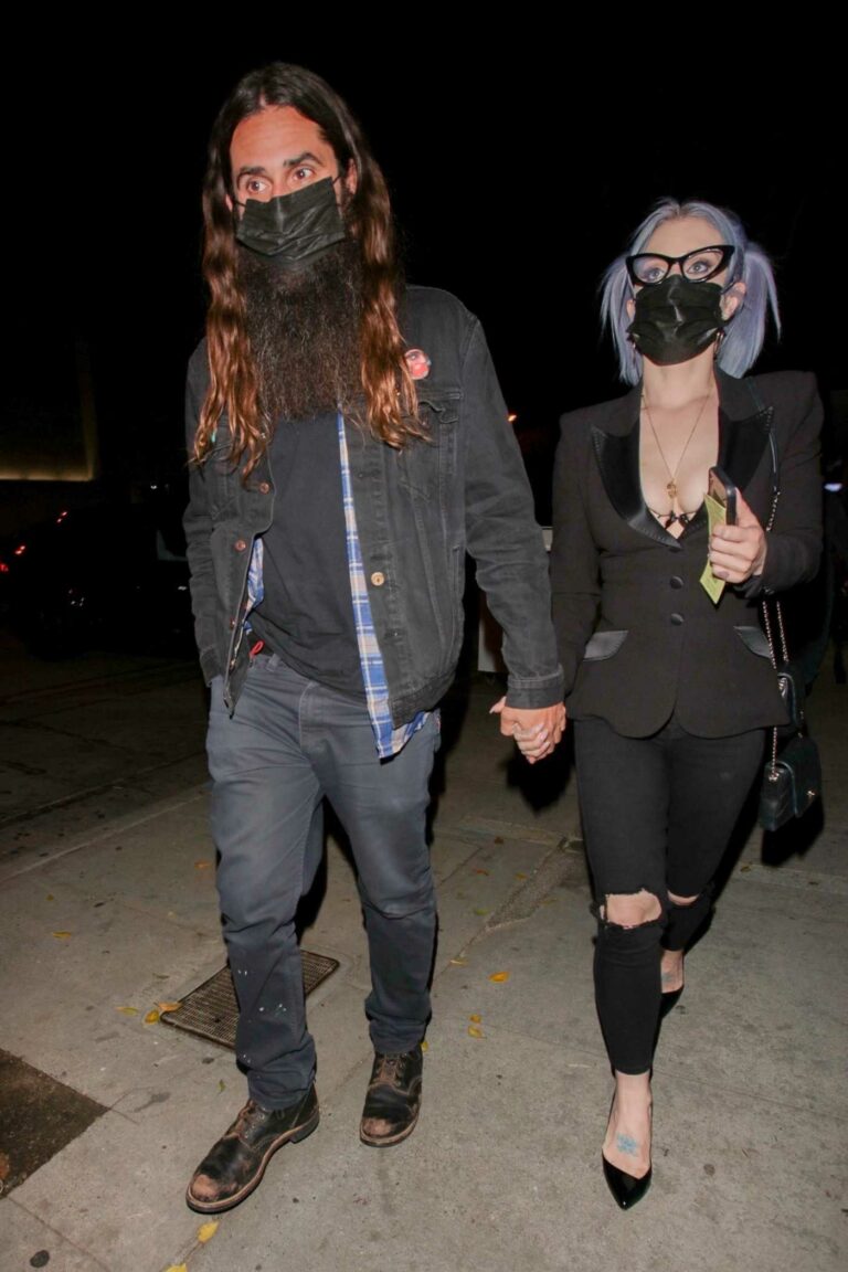 Kelly Osbourne in a Black Protective Mask