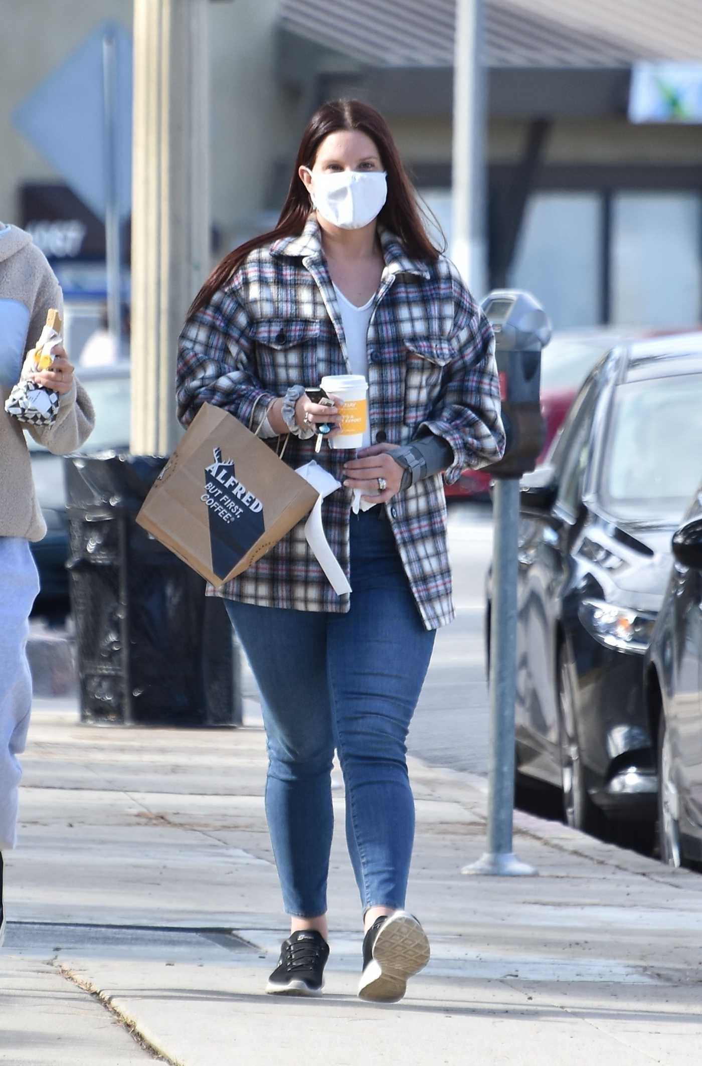 Lana Del Rey in a Plaid Shirt Goes Out for coffee with a Friend at Alfred Coffee in Studio City 02/02/2021