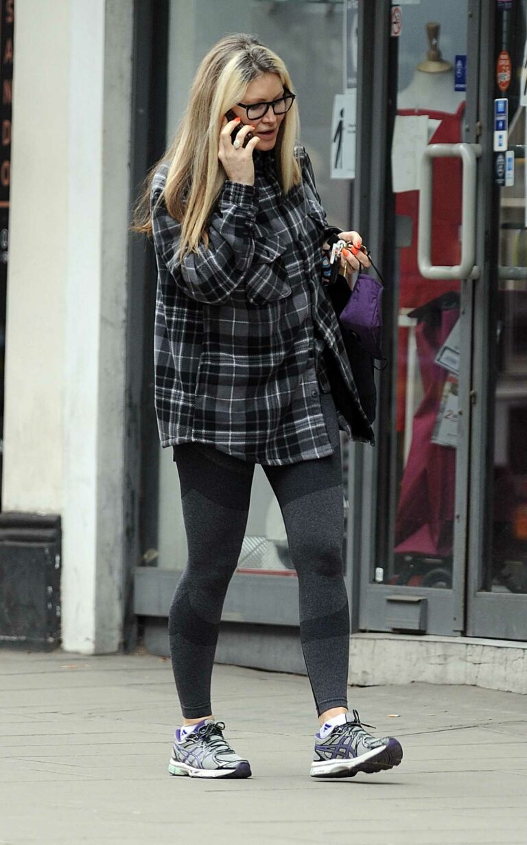 Caprice Bourret in a Black Baggy Check Shirt