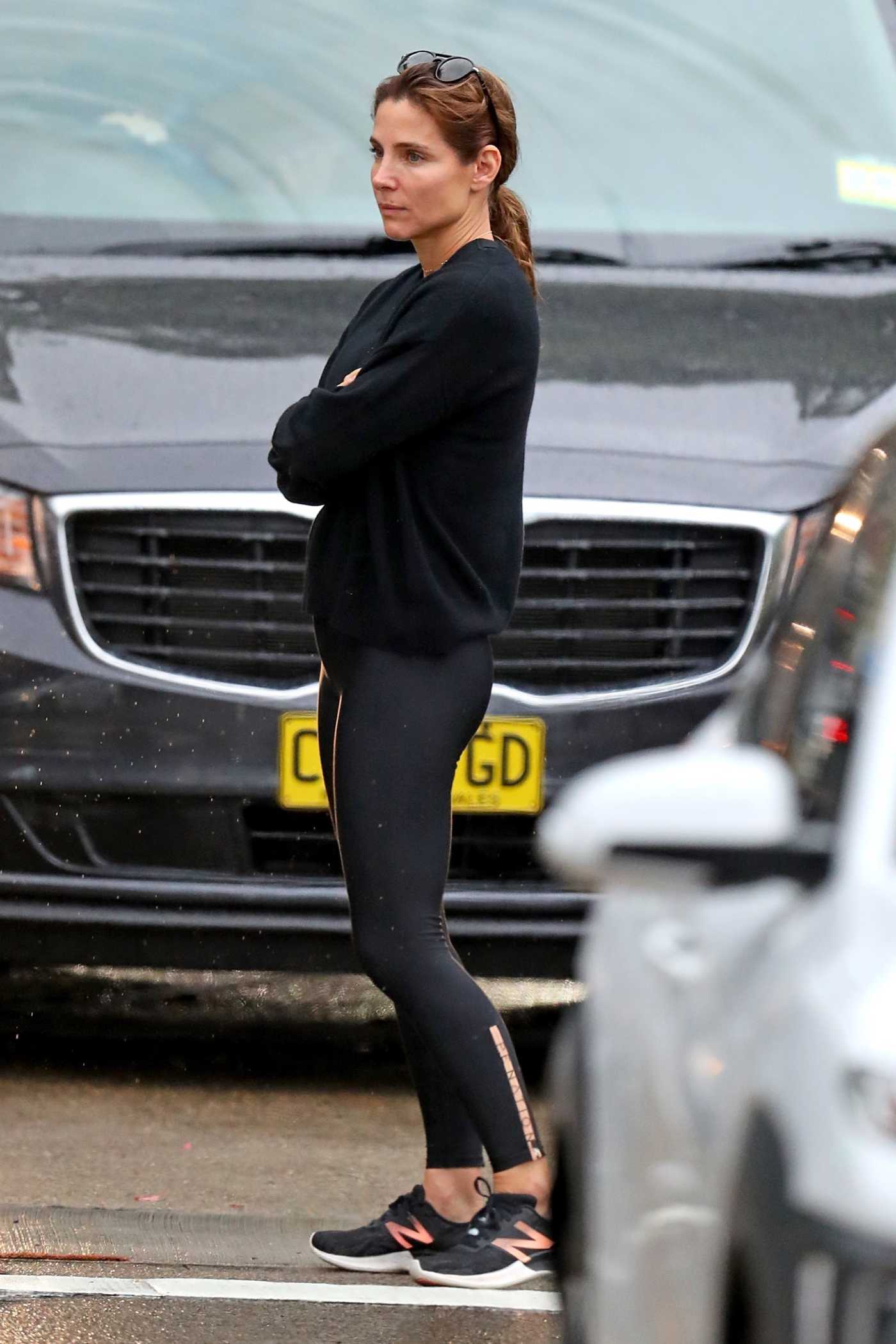 Elsa Pataky in a Black Outfit Steps Out in the Rain in Sydney 03/18/2021