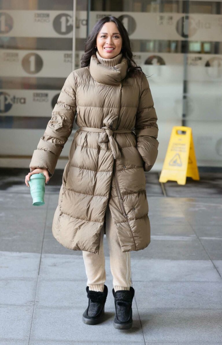 Katya Jones in a Beige Puffer Coat