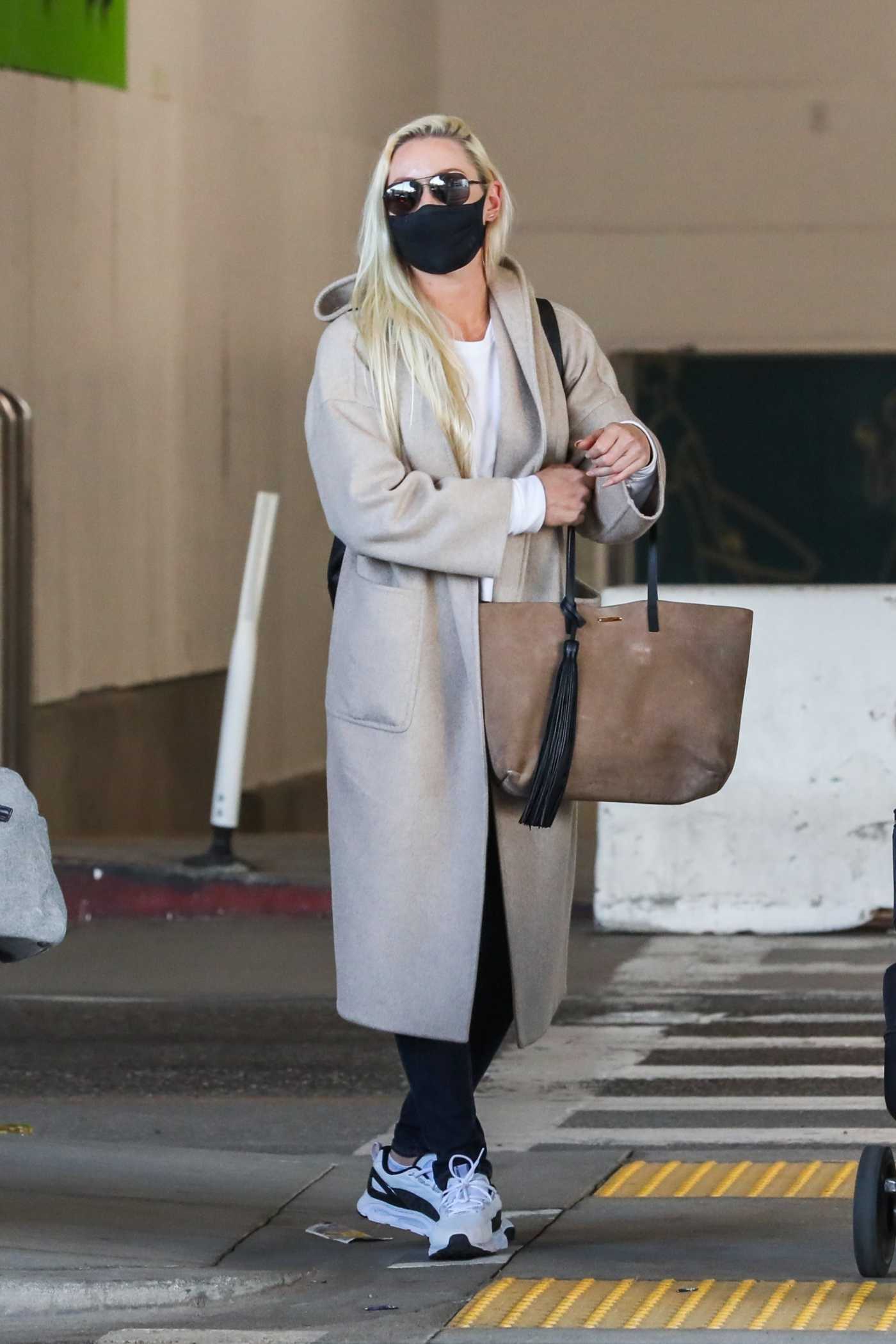 Lindsey Vonn in a Beage Coat Arrives at LAX Airport in LA 03/29/2021