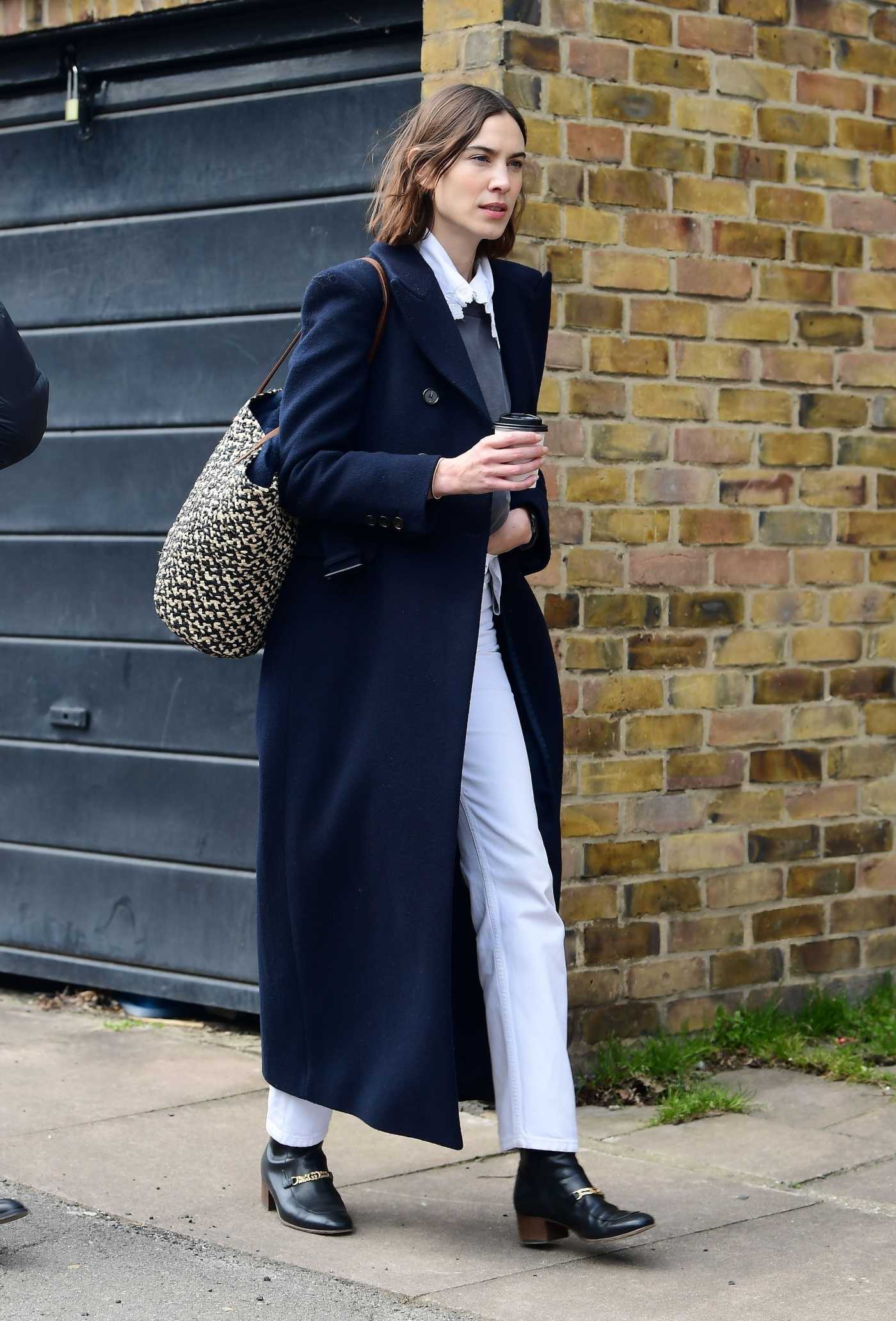Alexa Chung in a Black Coat Was Seen Out in London 04/08/2021