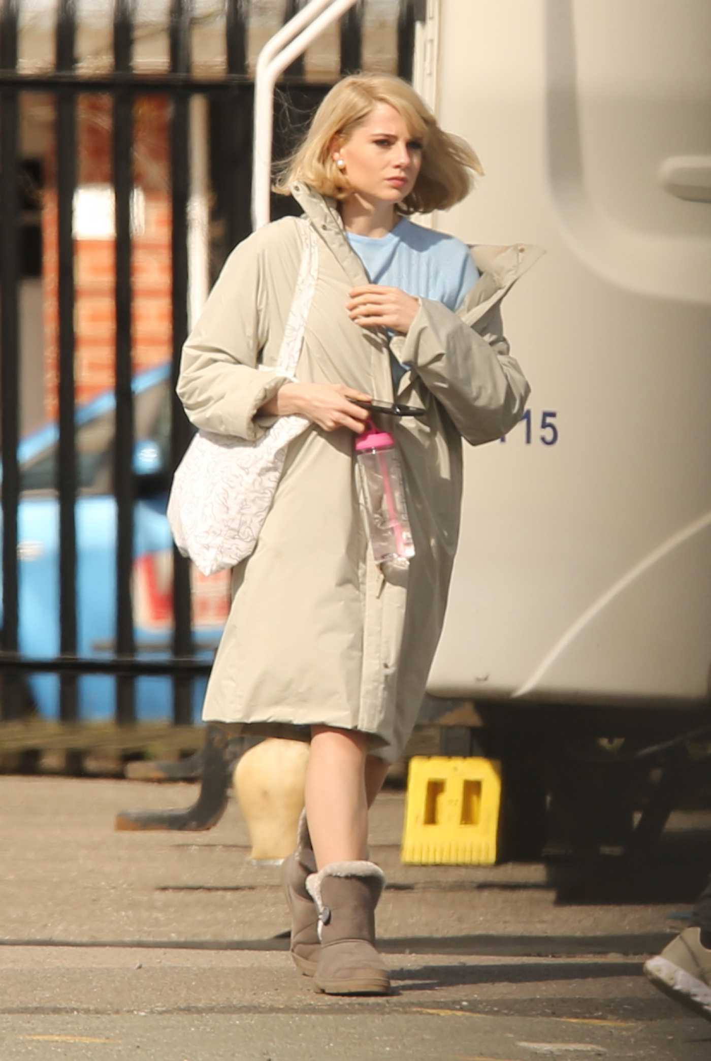Lucy Boynton in a Beige Coat on the Set of The Ipcress Files in Liverpool 04/06/2021