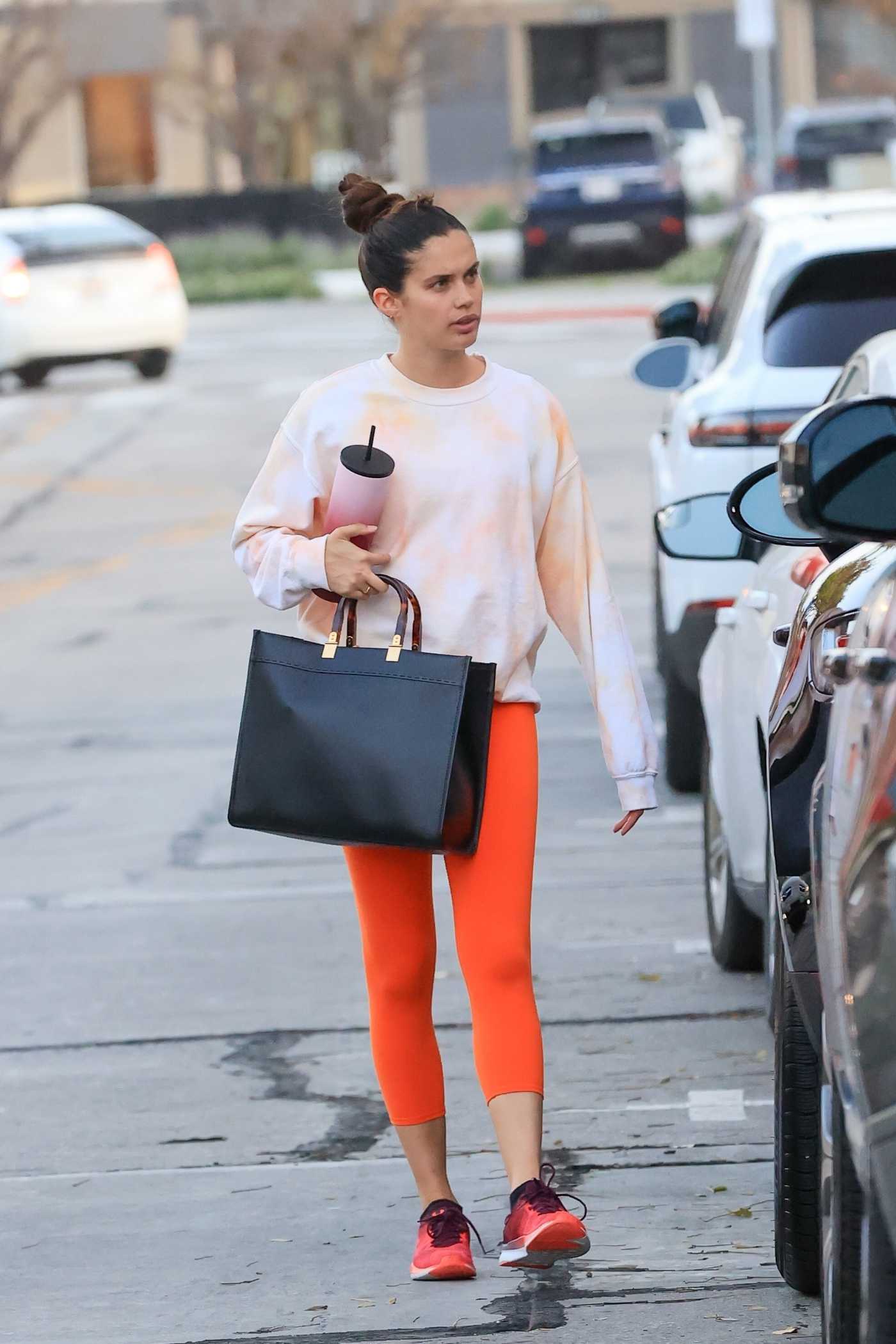 Sara Sampaio in an Orange Leggings Arrives at Dogpound Gym in West Hollywood 04/12/2021