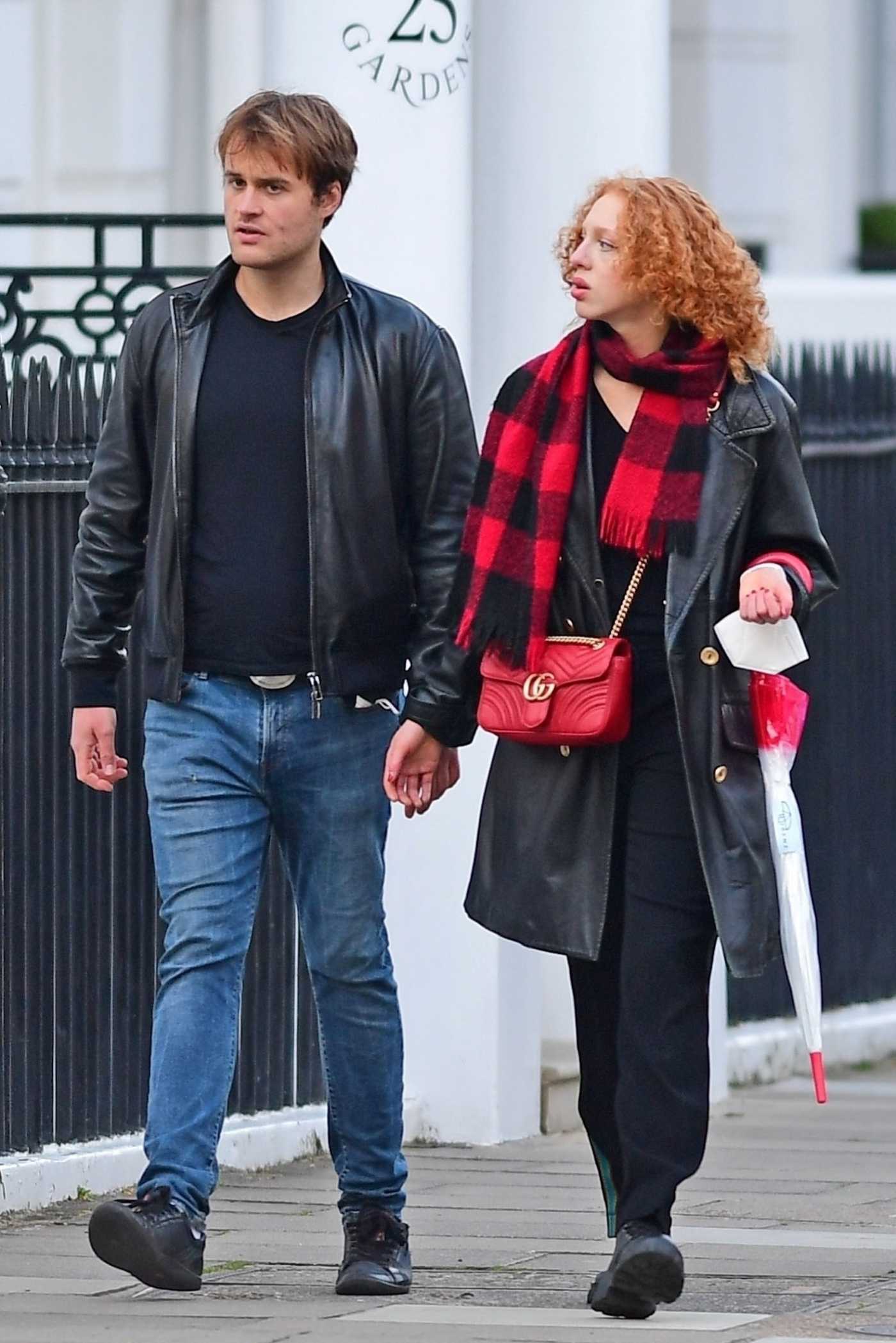 Anna Ermakova in a Black Leather Trench Coat Was Seen Out with Her Boyfriend in London 05/14/2021