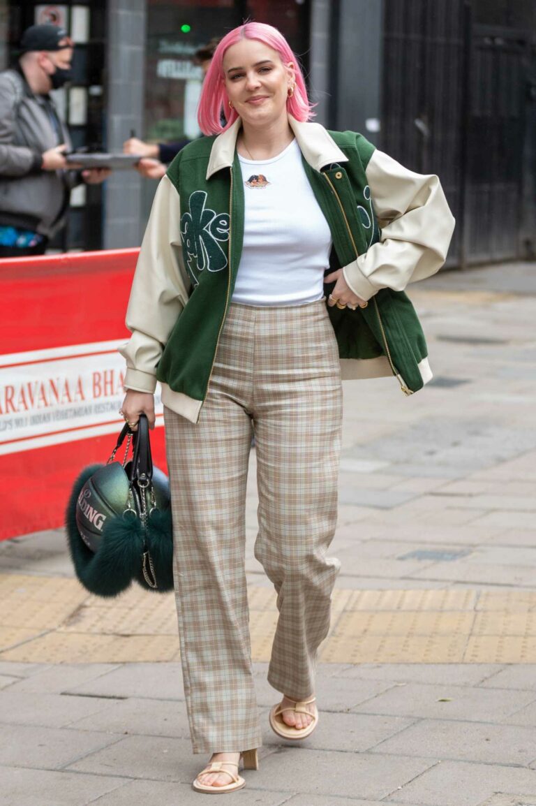 Anne-Marie in a Beige Checked Pants