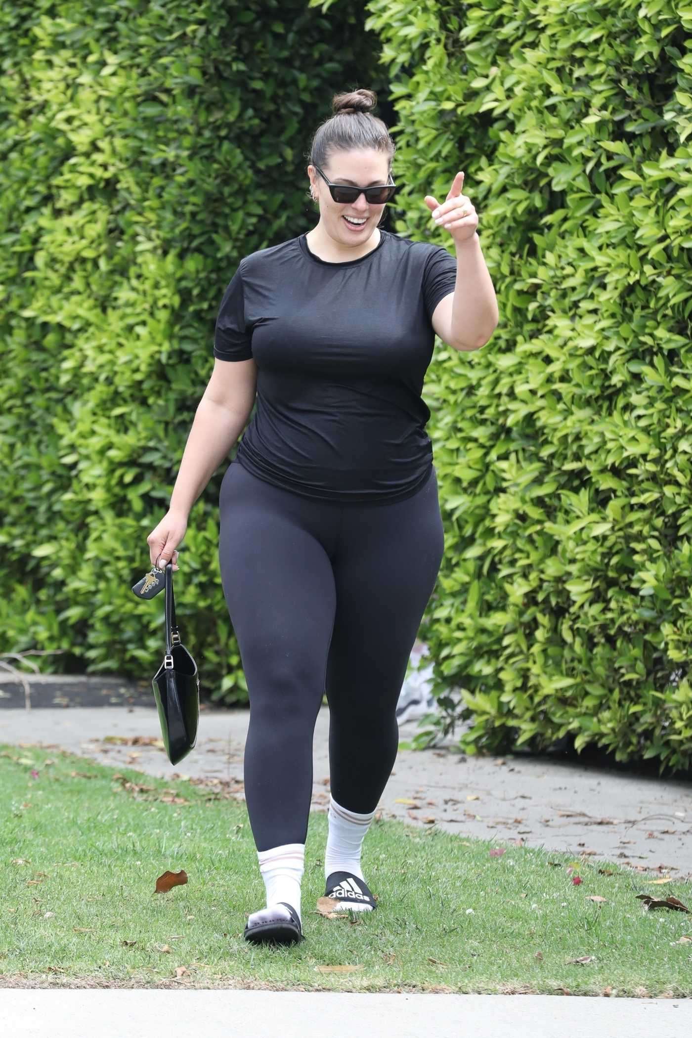 Ashley Graham in a Black Tee Exits a Private Pilates Class in West Hollywood 05/14/2021