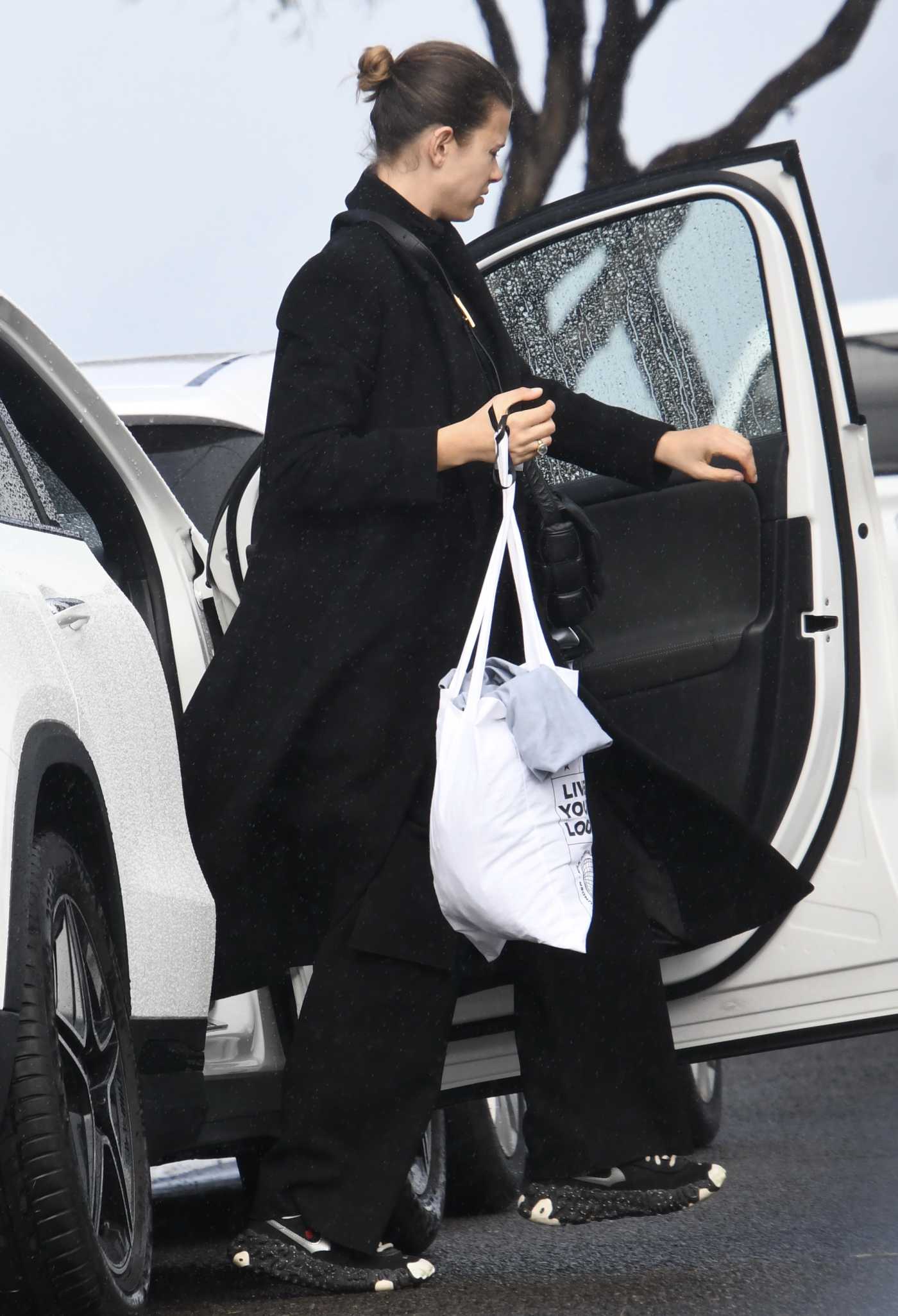 Georgia Fowler in a Black Coat Was Seen Out in Sydney 06/20/2021