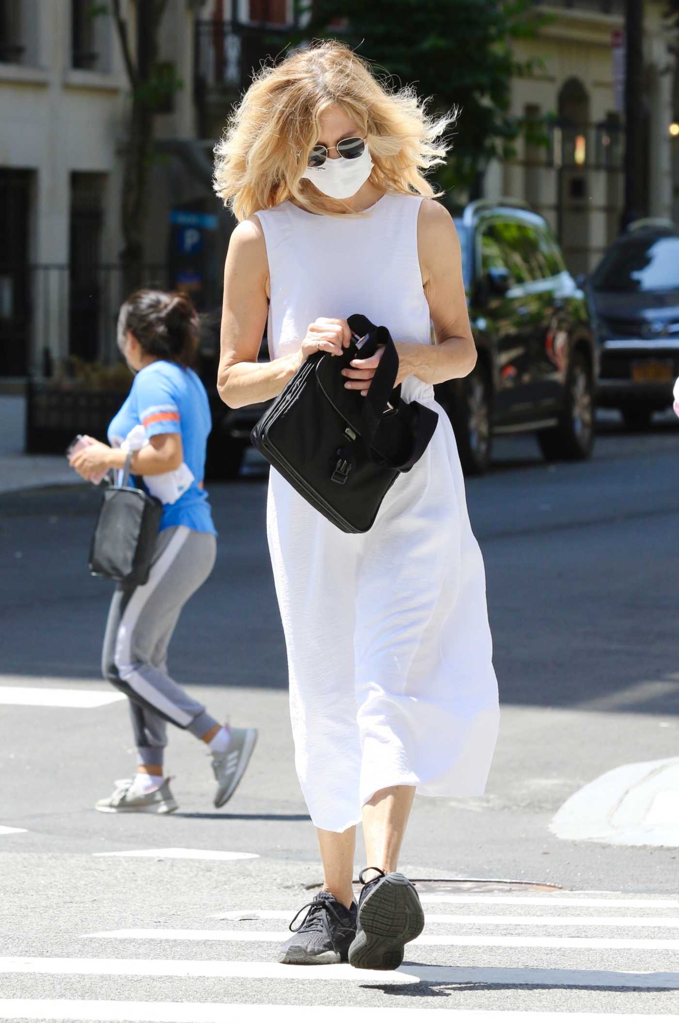 Meg Ryan in a White Dress Was Seen Out in Manhattan’s Upper West Side in NYC 06/18/2021