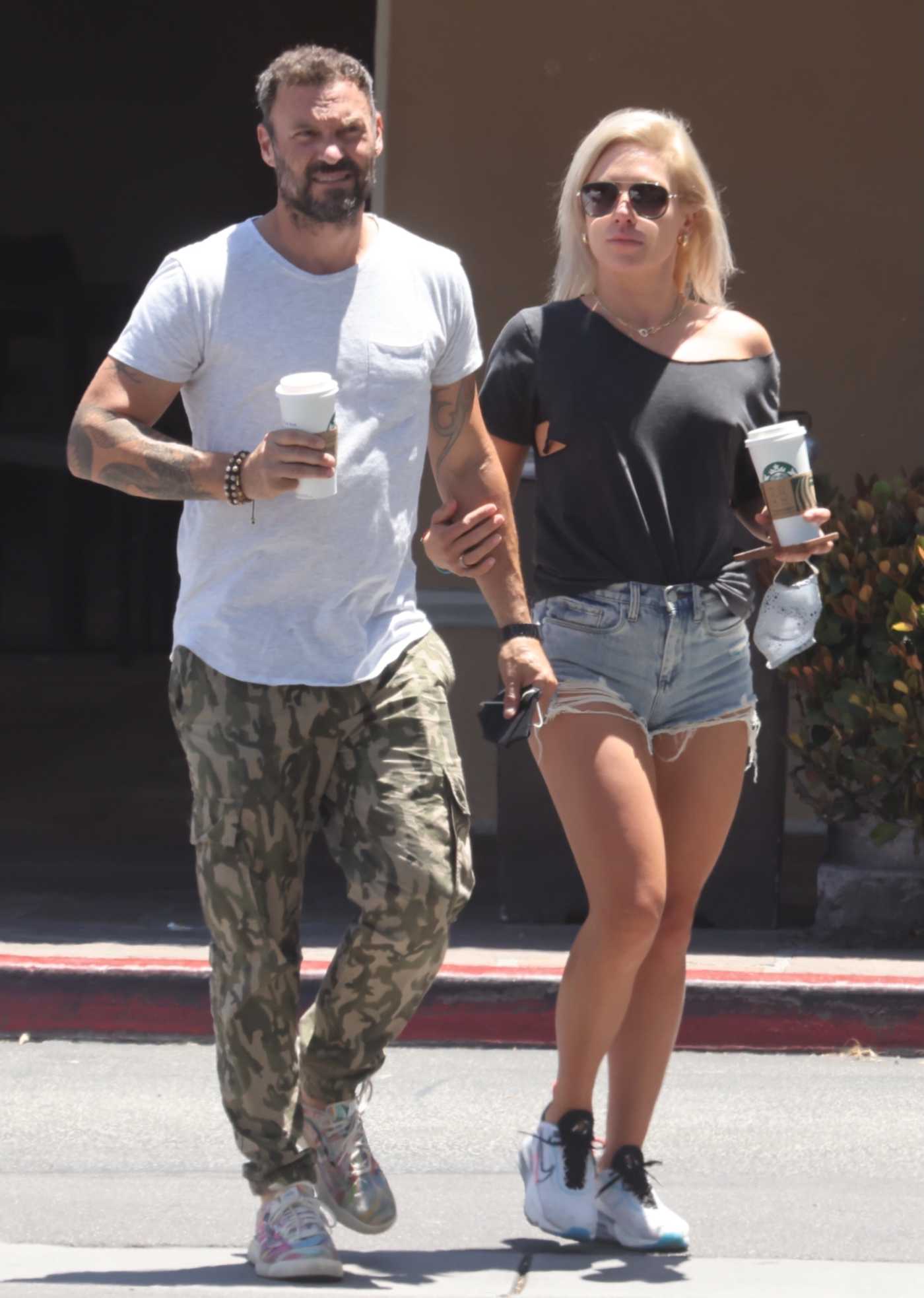 Sharna Burgess in a Black Tee Leaves a Starbucks Out with Brian Austin Green in Malibu 06/08/2021