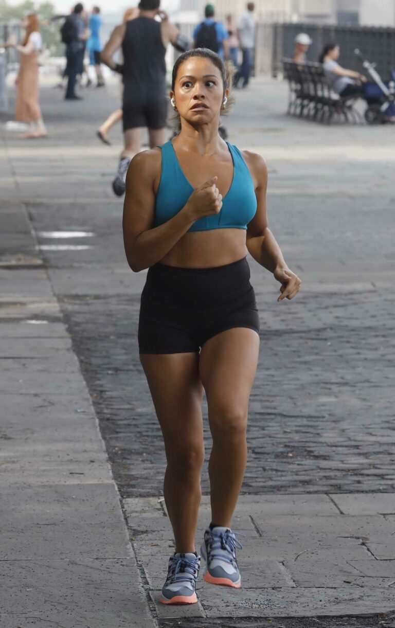 Gina Rodriguez in a Blue Sports Bra
