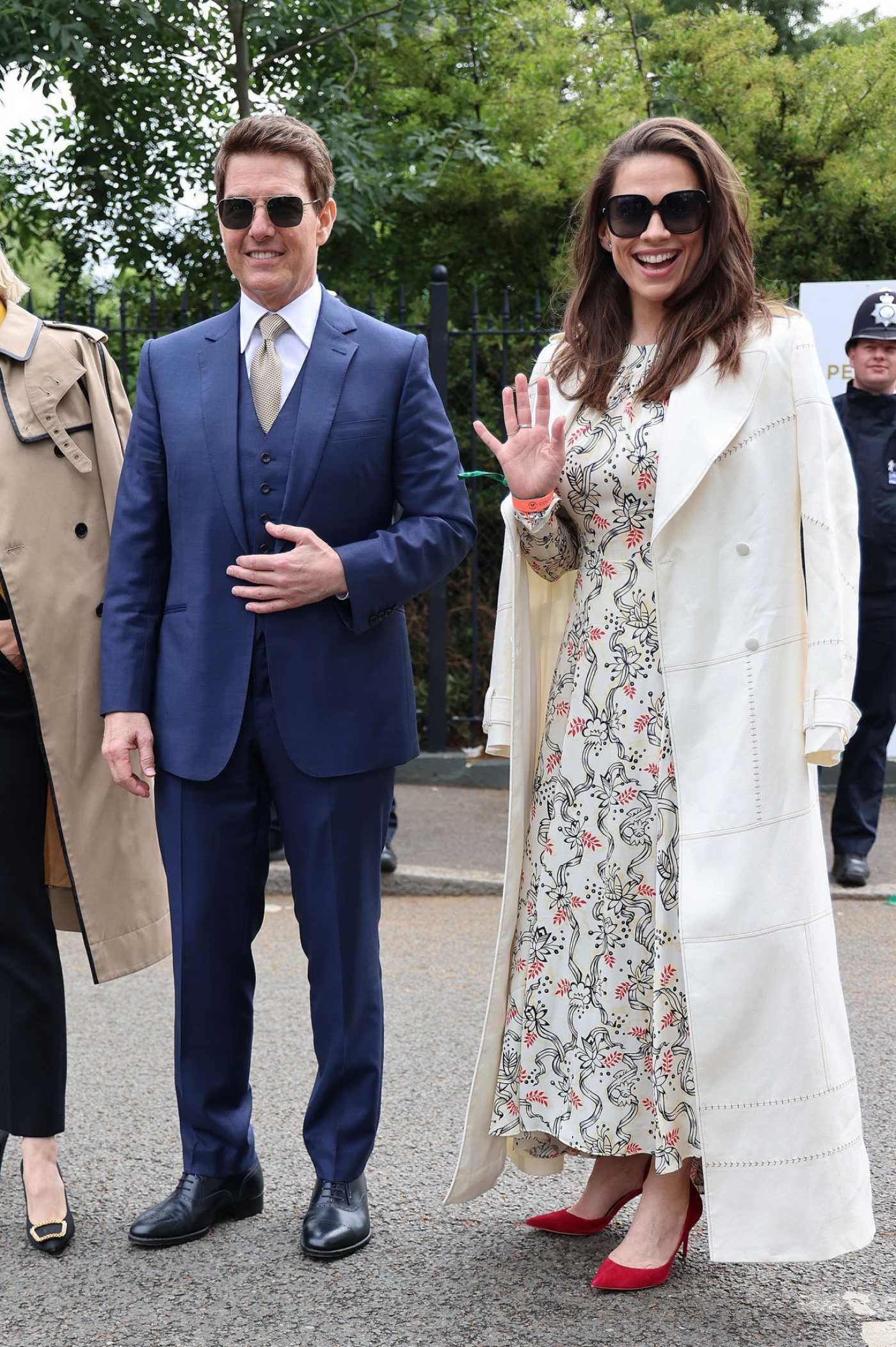 Hayley Atwell in a White Trench Coat Attends the Wimbledon Championships Tennis Tournament Out with Tom Cruise in London 07/10/2021