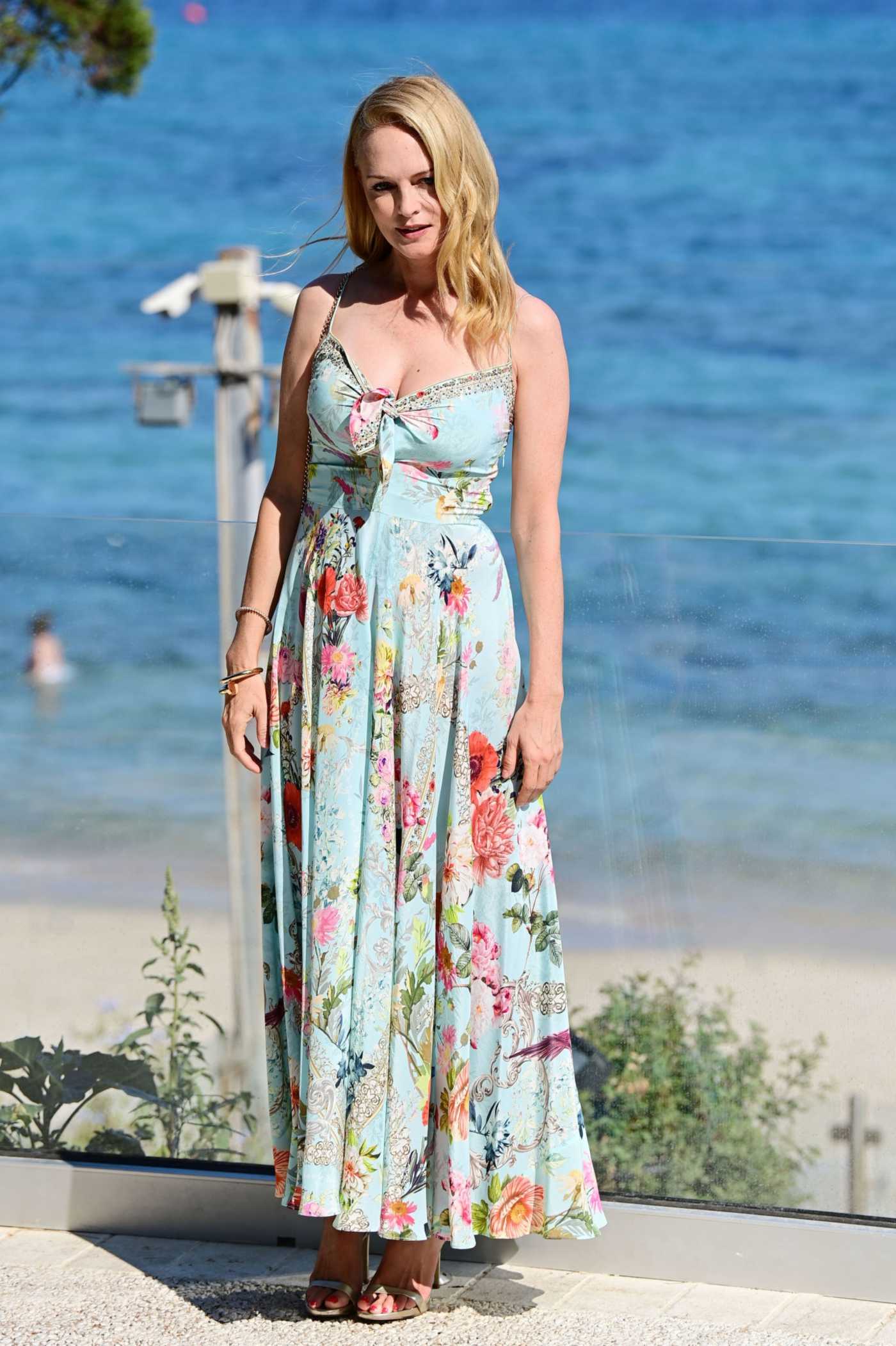 Heather Graham in a Baby Blue Floral Dress Attends 2021 Filming Italy Festival Day 2 at Forte Village Resort in Santa Margherita di Pula, Italy 07/23/2021