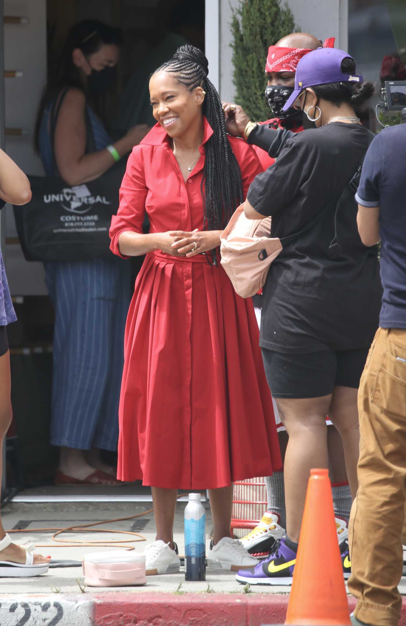 Regina King in a Red Dress Was Spotted on the Set of a Commercial in Los Angeles 07/29/2021