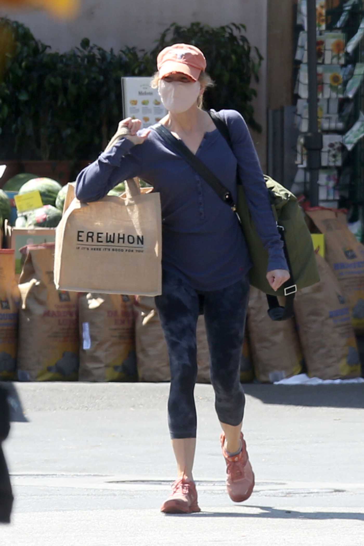Renee Zellweger in an Orange Cap Stocks Up on Groceries at Whole Foods in Los Angeles 07/03/2021