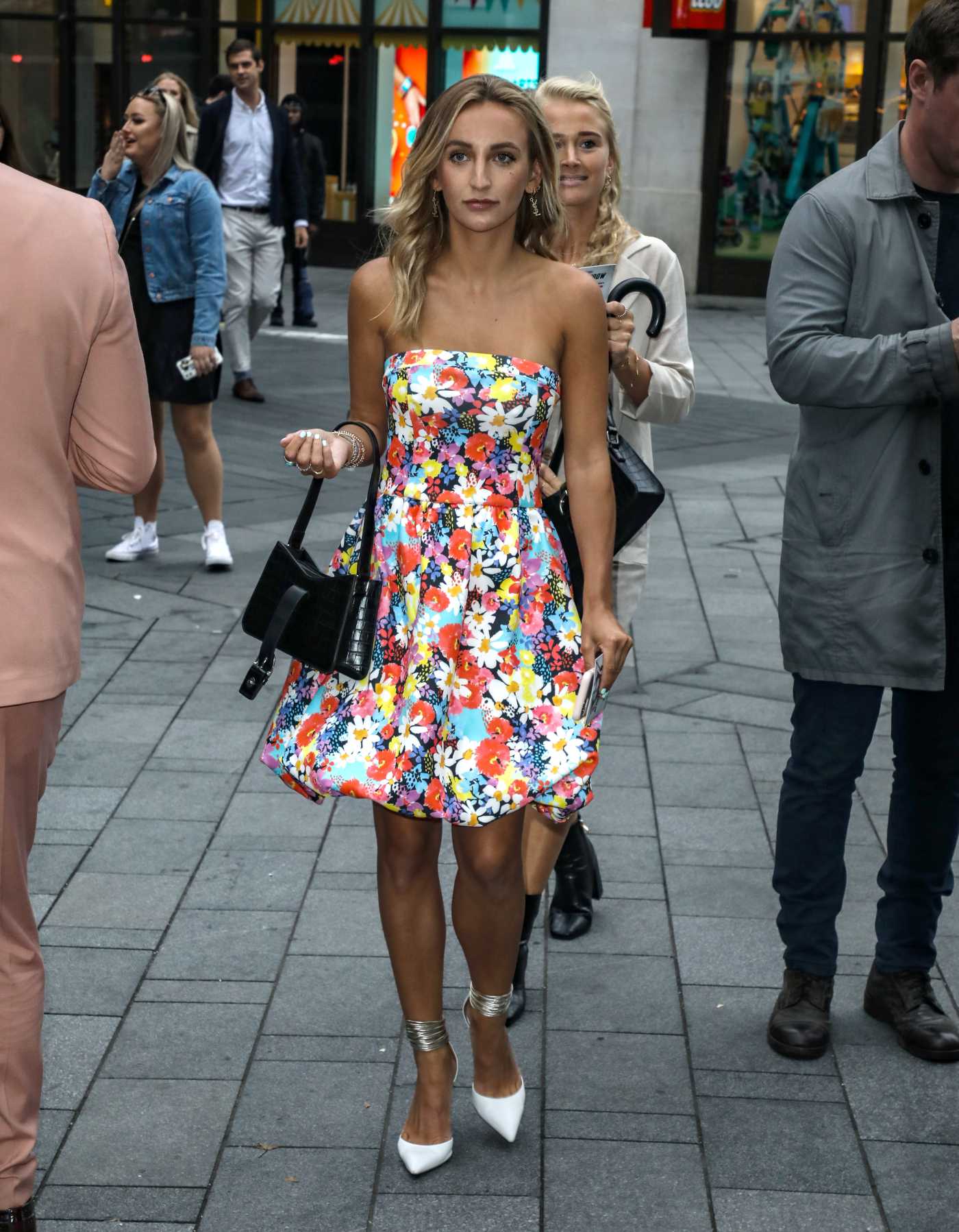Tiffany Watson in a Floral Dress Arrives at the Black Widow Premiere in London 06/29/2021