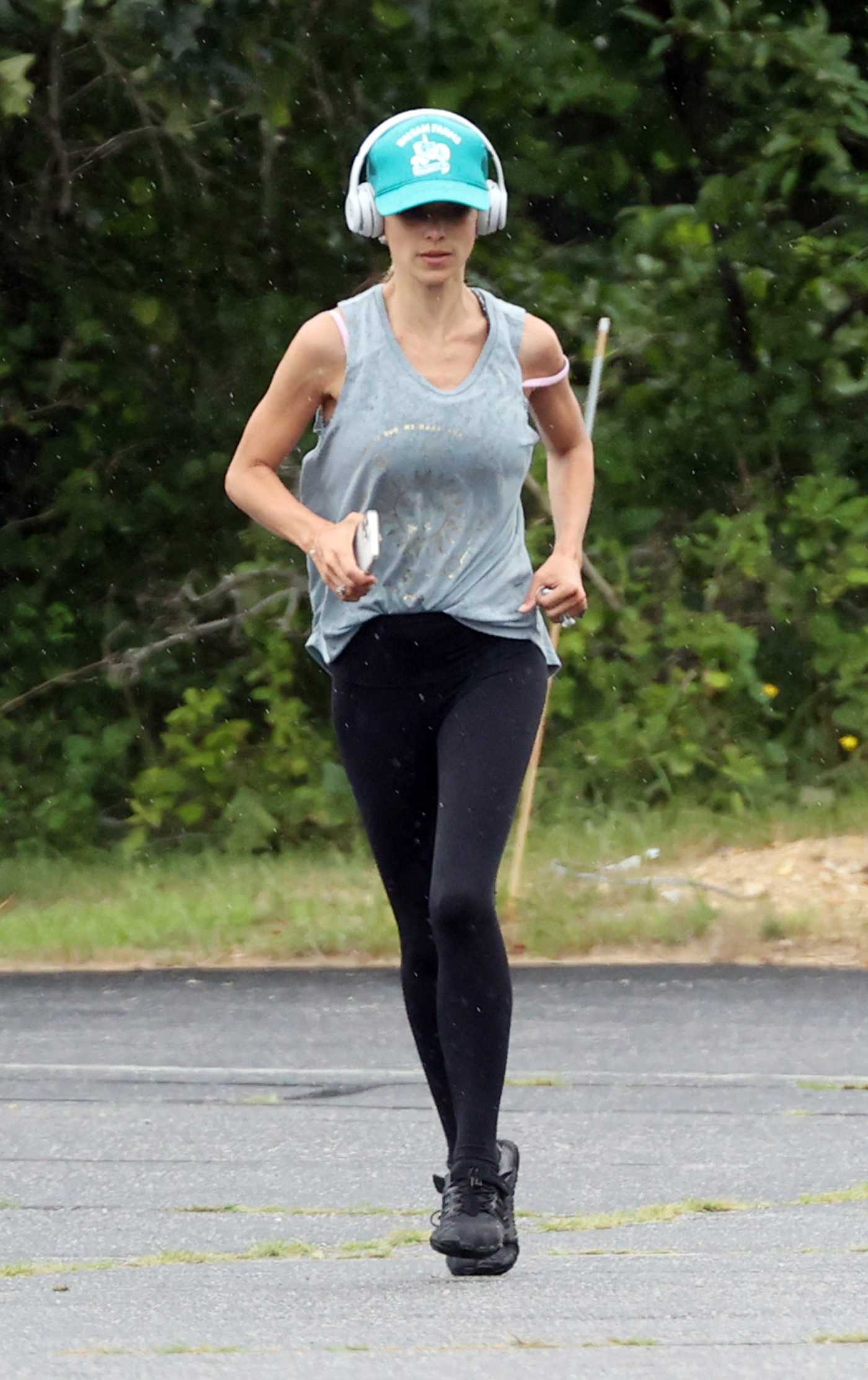Hilaria Baldwin in a Grey Tank Top Was Spotted Out Jogging in The Hamptons in New York 08/04/2021