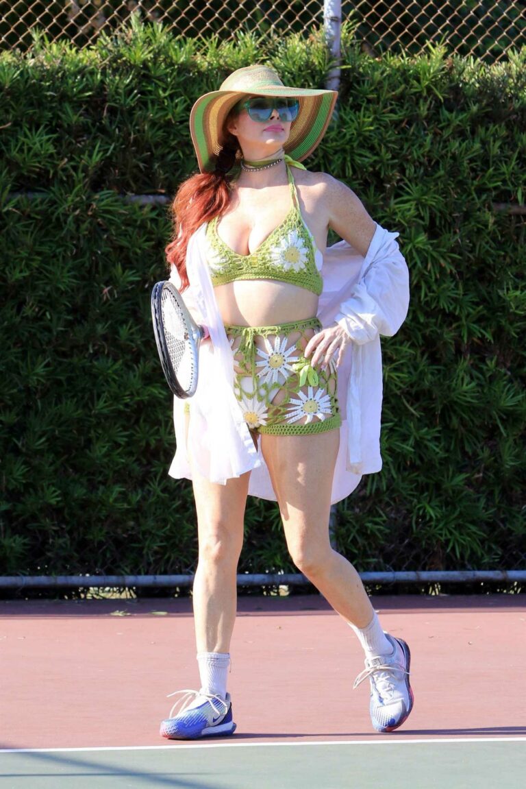 Phoebe Price in a Green Bikini Top
