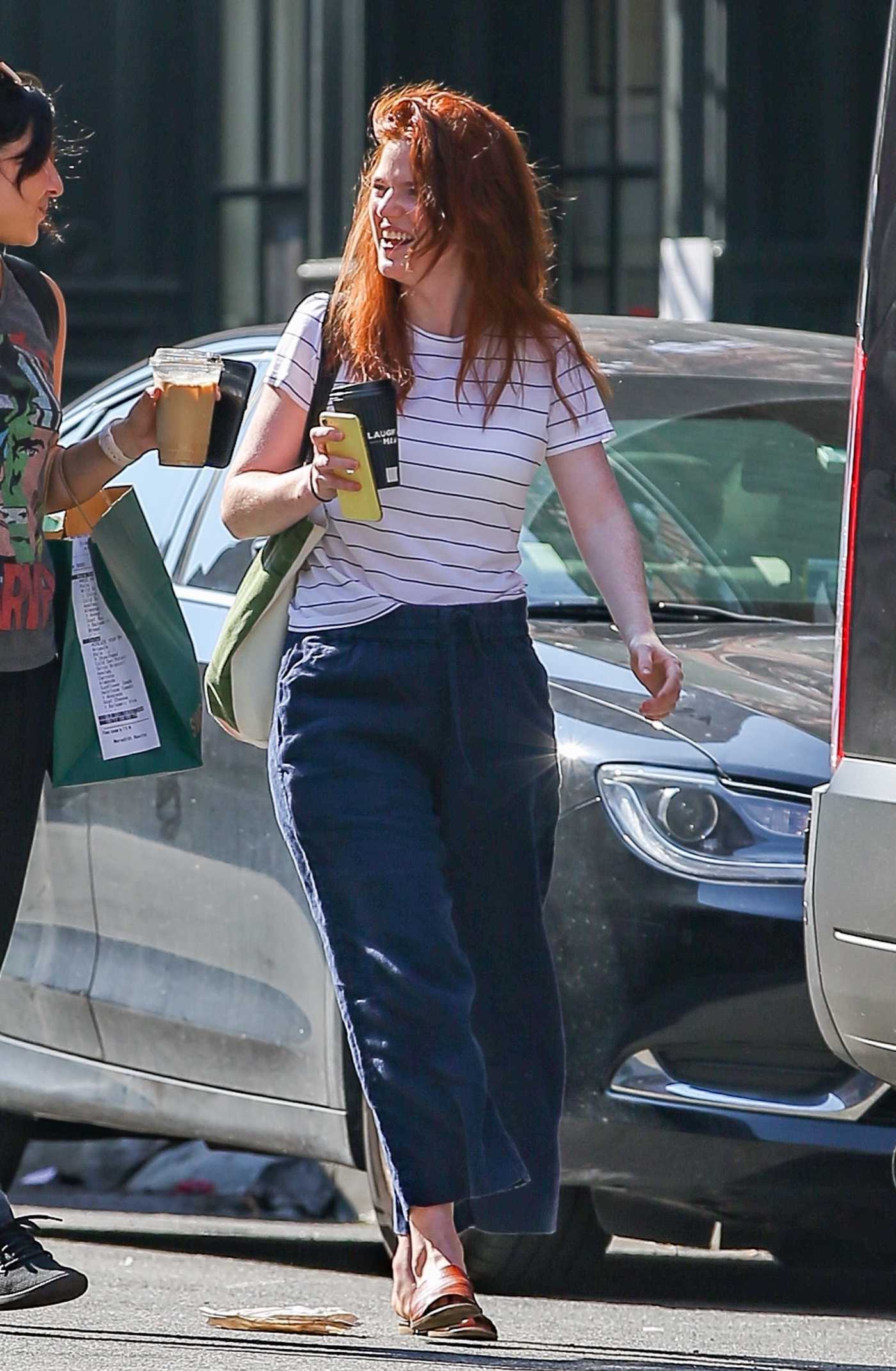 Rose Leslie in a White Striped Tee Grabs Coffee in New York 08/13/2021