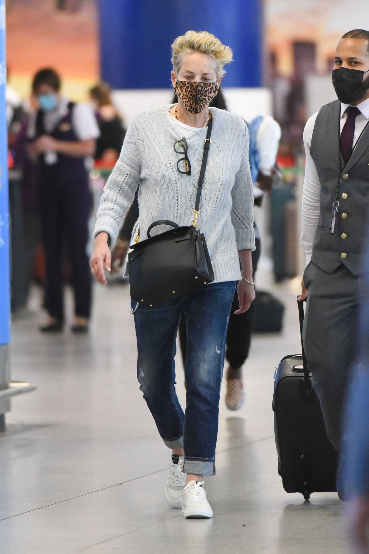 Sharon Stone in a Grey Sweater Arrives JFK Airport in New York 08/28/2021