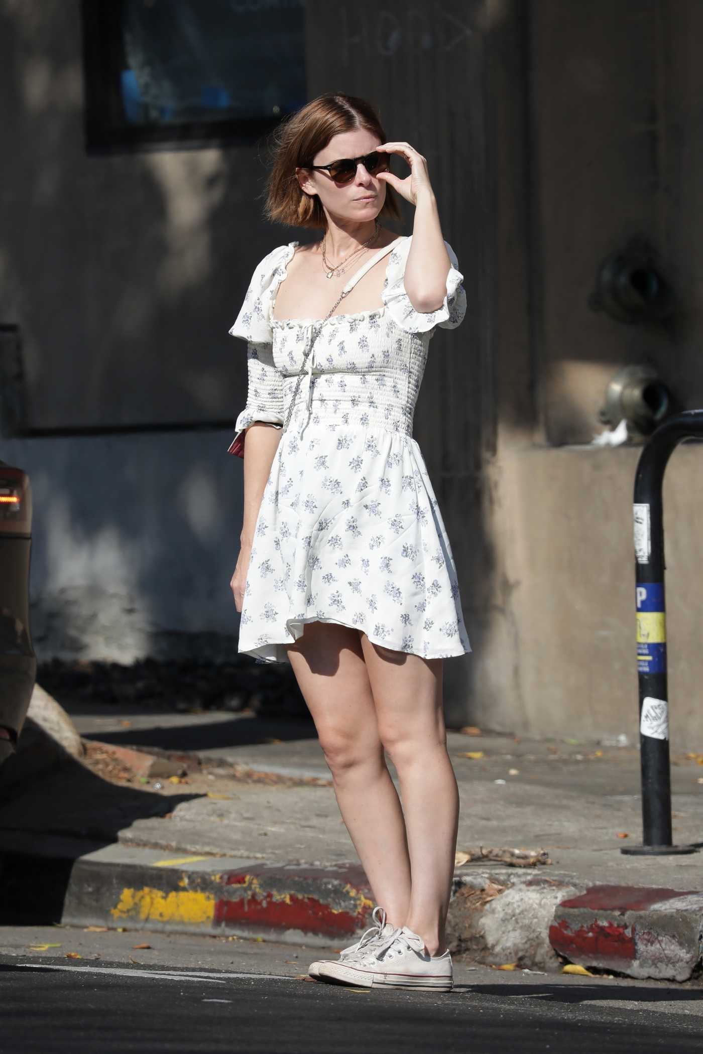 Kate Mara in a Floral White Dress Leaves the Little Dom's Restaurant in Los Feliz 09/20/2021