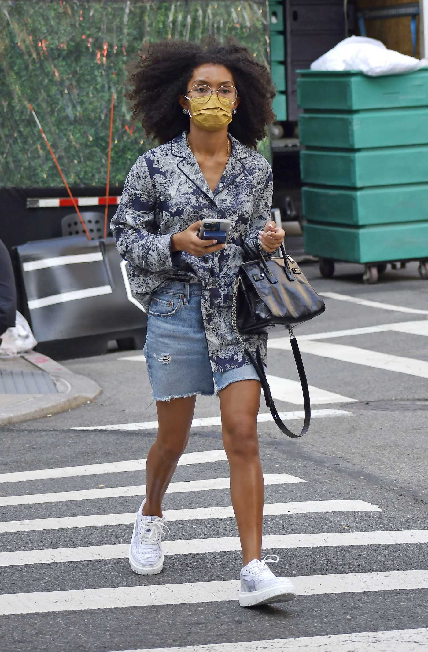 Yara Shahidi in a Blue Denim Shorts Was Seen Out on Madison Avenue in New York 09/12/2021
