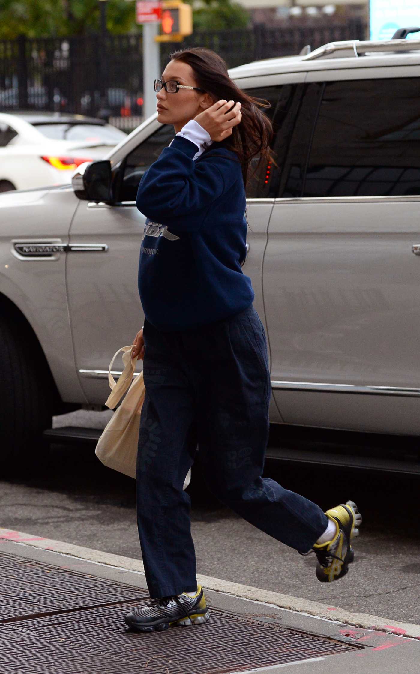 Bella Hadid in a Blue Sweatshirt Arrives at Her Apartment in New York City 10/29/2021