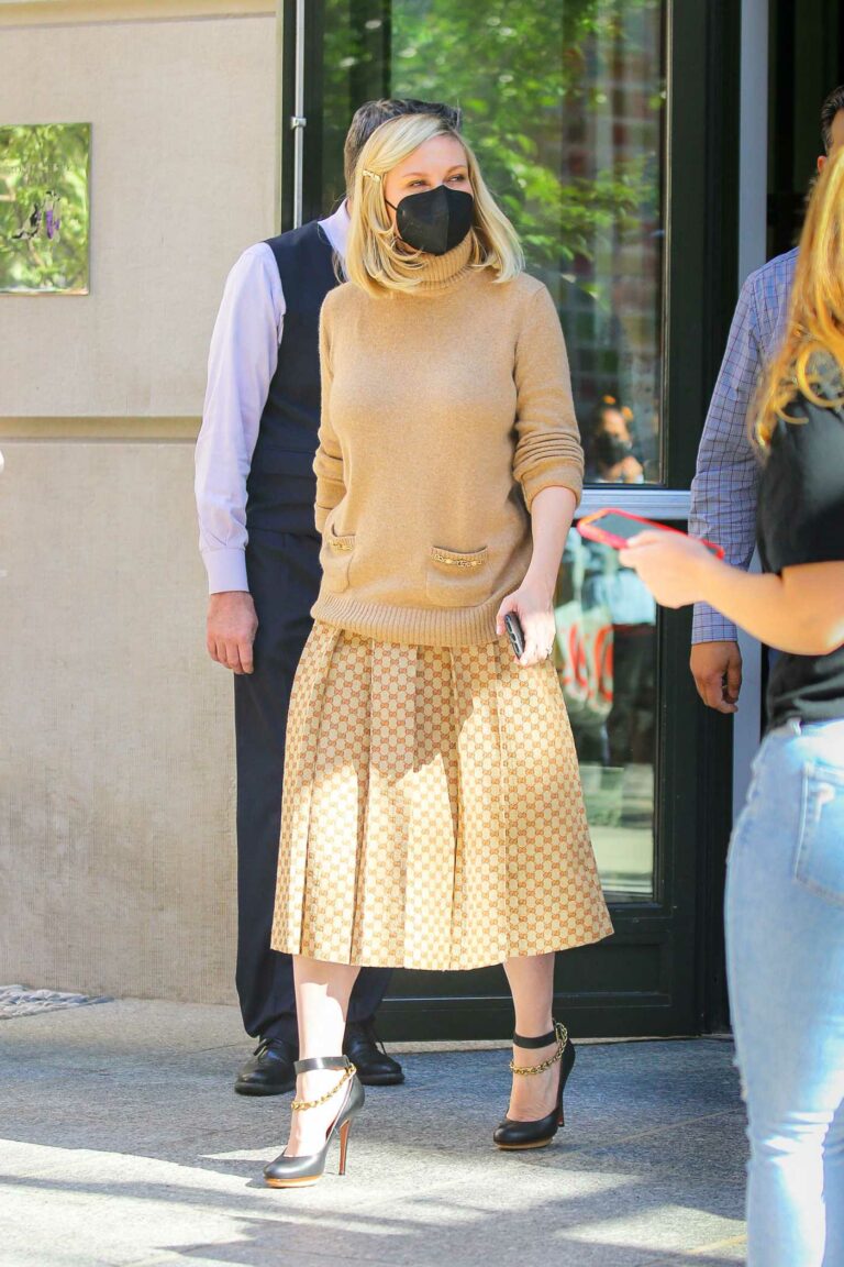 Kirsten Dunst in a Black Protective Mask