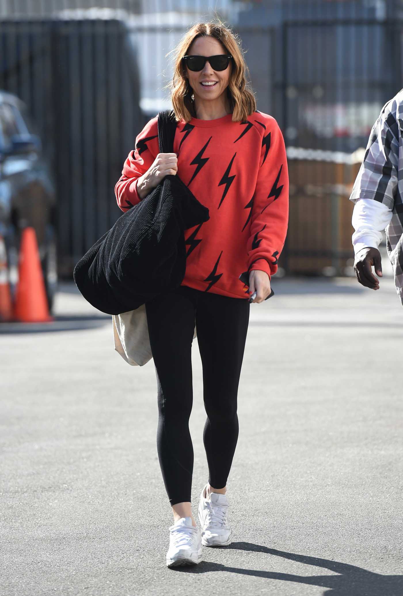 Melanie Chisholm in a Red Sweatshirt Arrives at the Dancing with the Stars Show Rehearsals in Los Angeles 10/13/2021