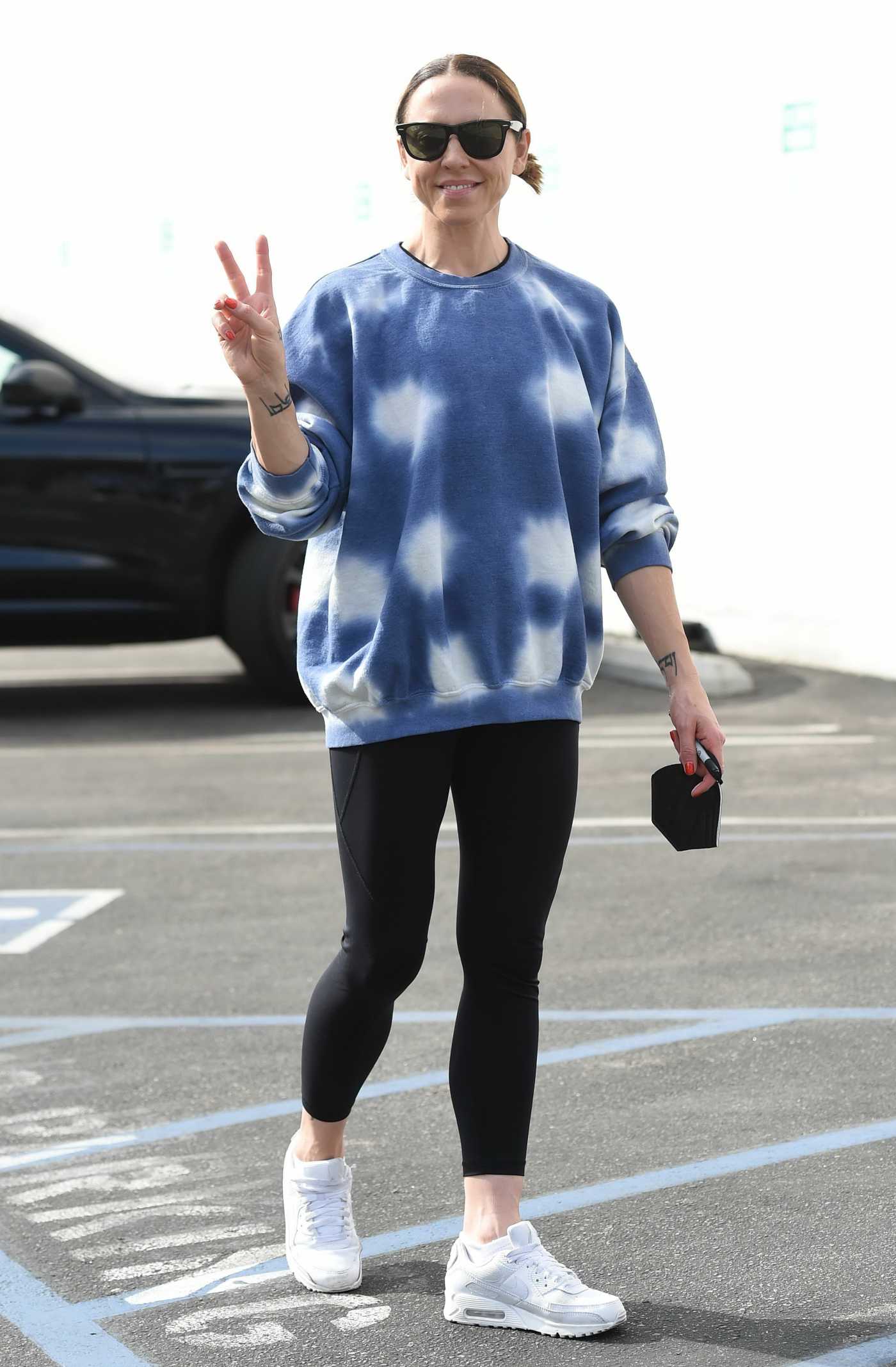 Melanie Chisholm in a White Sneakers Arrives at The Dancing with the Stars Show Rehearsals in Los Angeles CA 10/08/2021