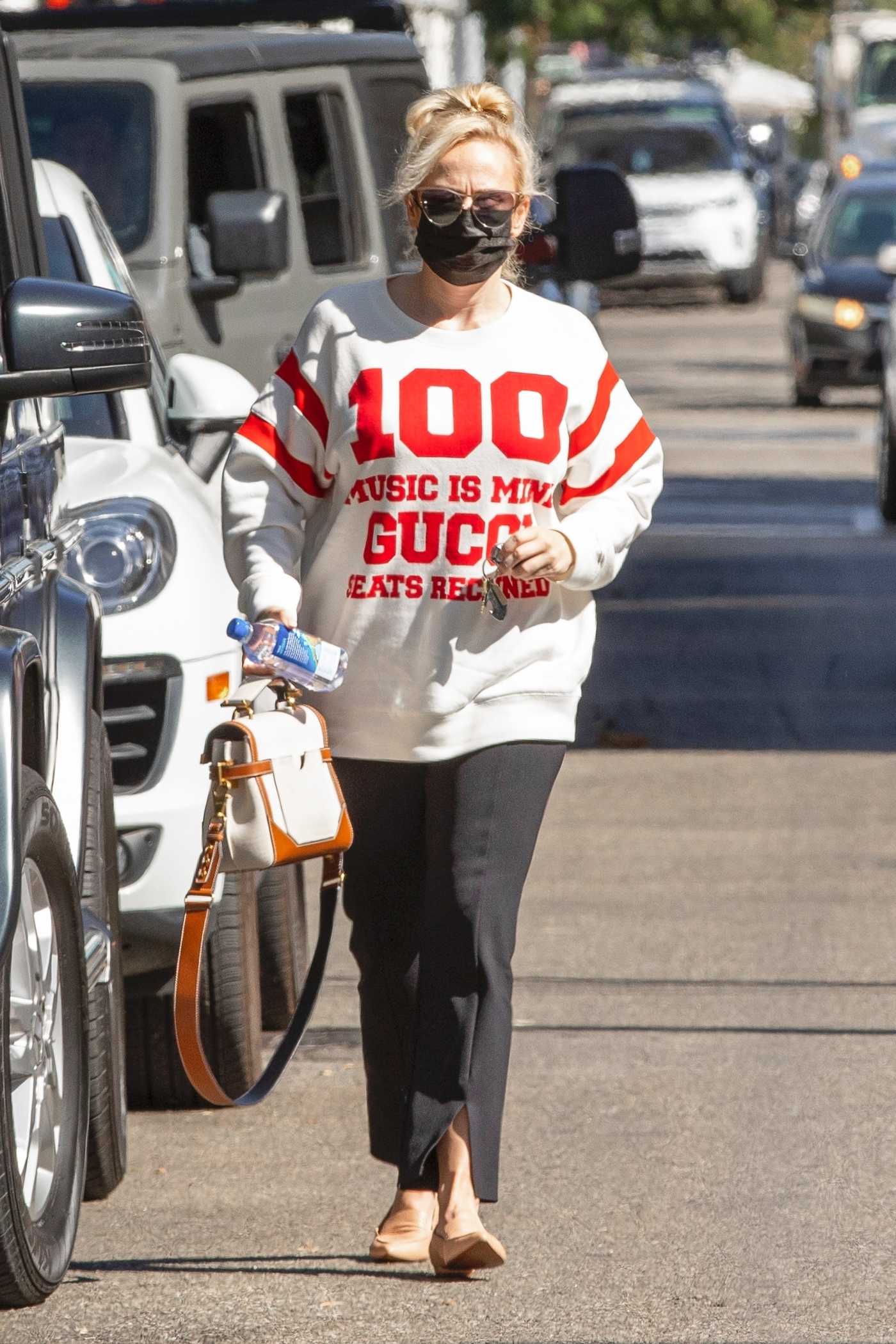 Rebel Wilson in Gucci 100 White Sweatshirt Arrives for a Doctor's Appointment in Beverly Hills 10/19/2021