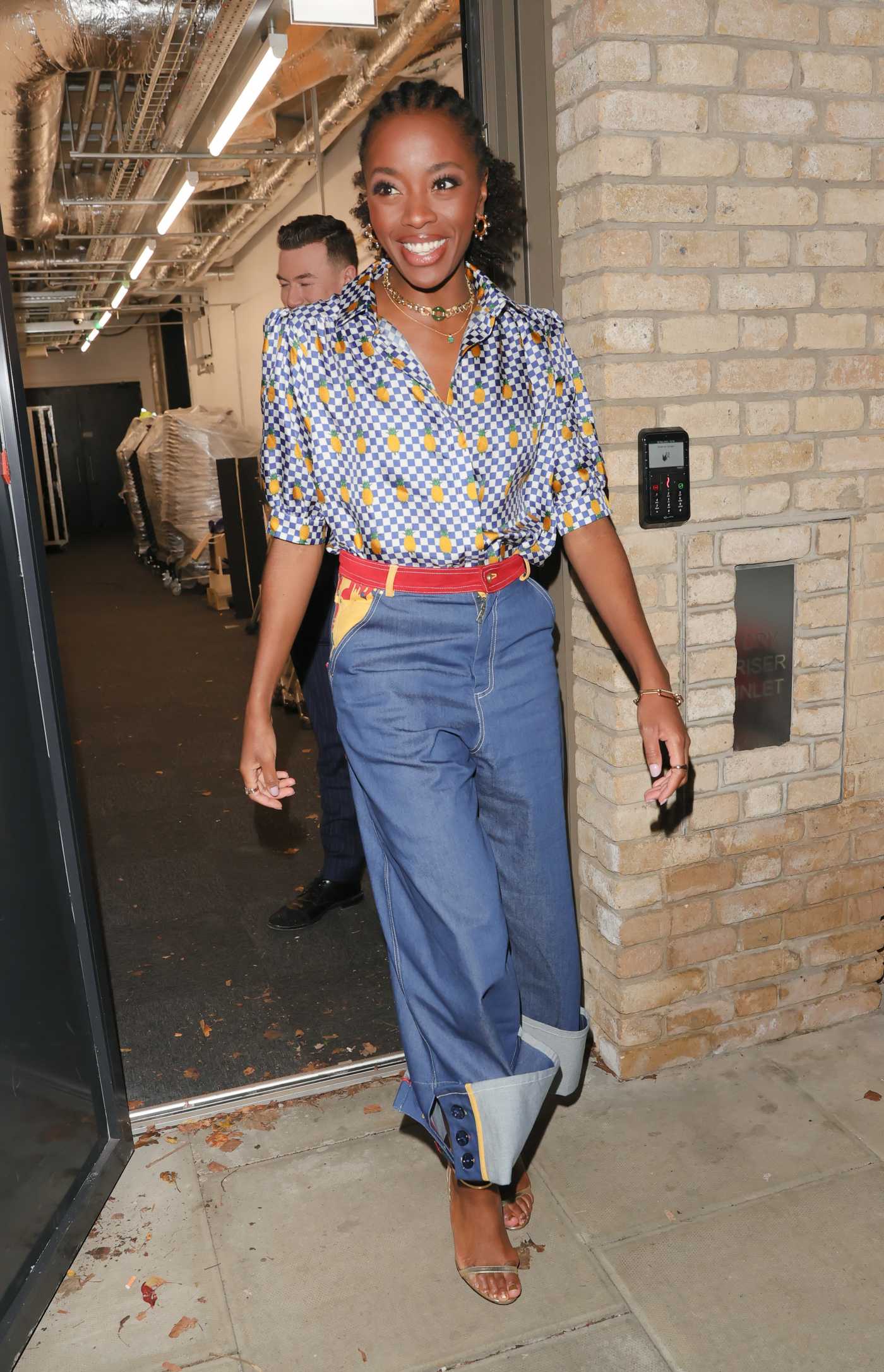 AJ Odudu in a Checked Blouse Exits It Takes Two Studios in London 11/23/2021