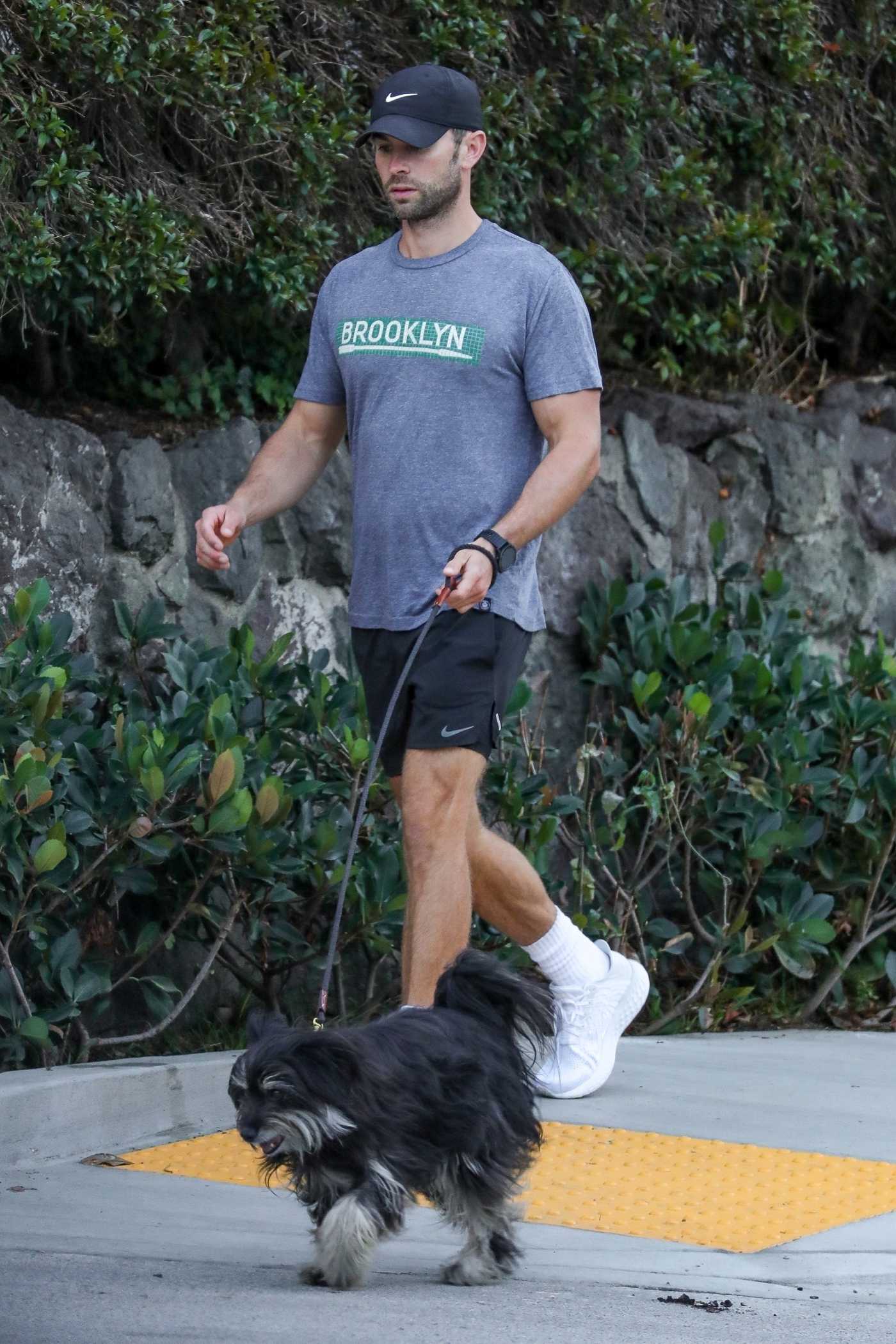 Chace Crawford in a Black Cap Walks His Dog in Los Feliz 10/28/2021