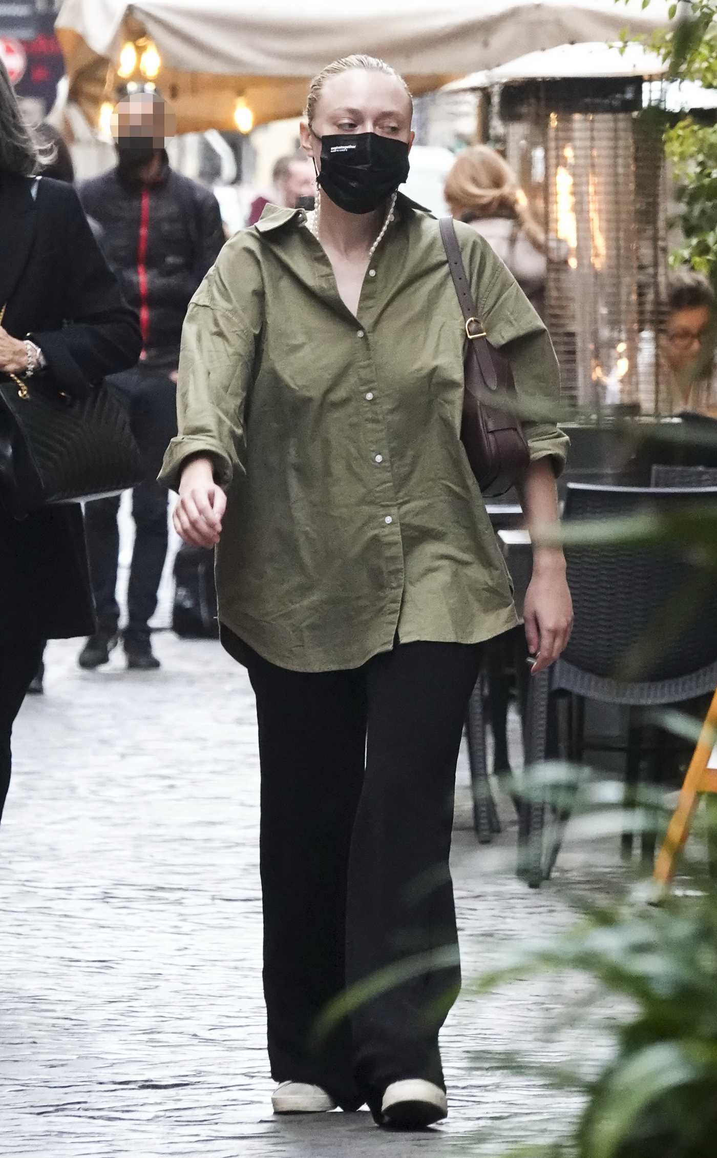 Dakota Fanning in an Olive Shirt Was Seen Out in Rome 11/17/2021