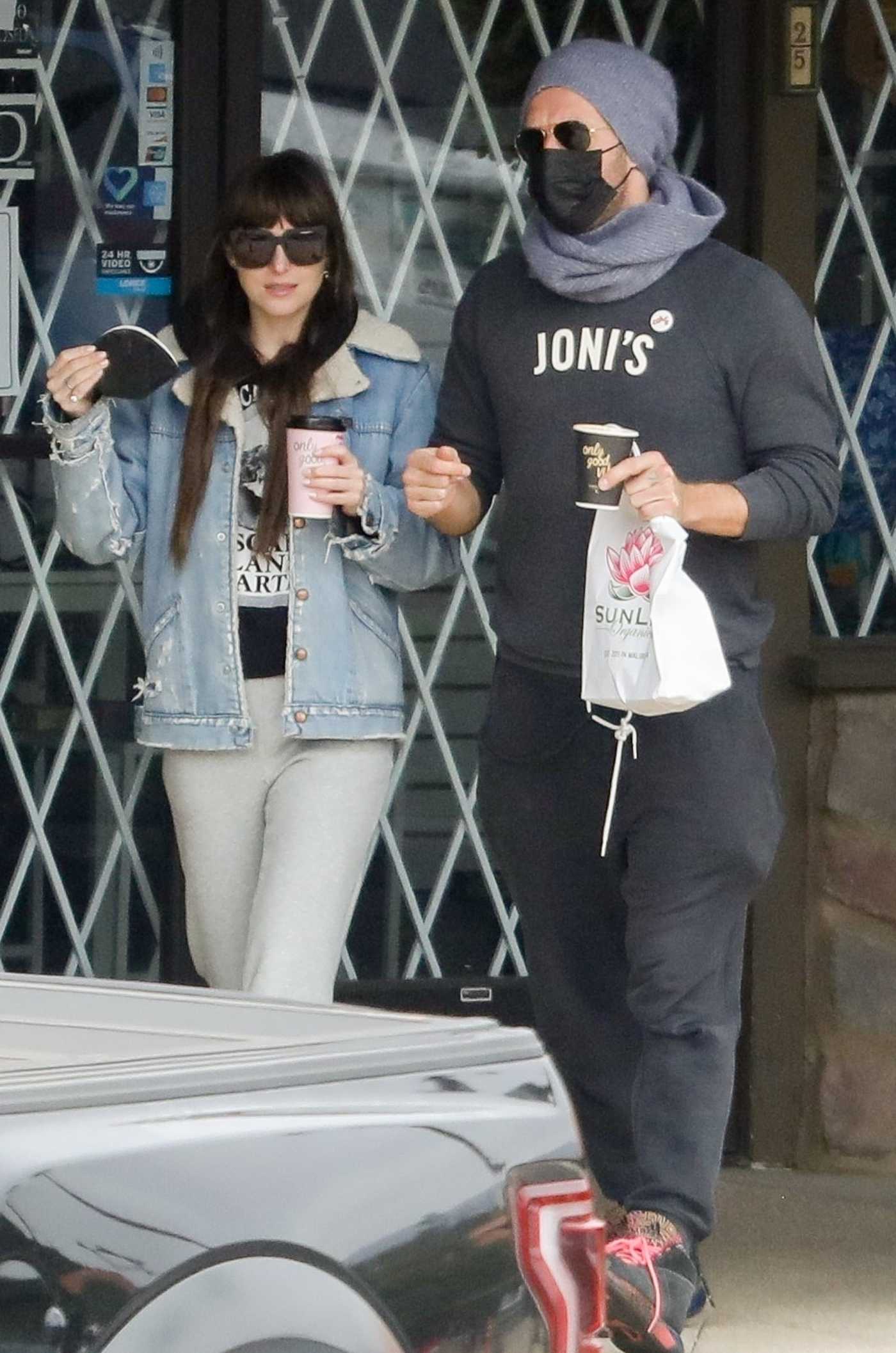 Dakota Johnson in a Blue Denim Jacket Was Seen Out with Chris Martin in Malibu 10/31/2021