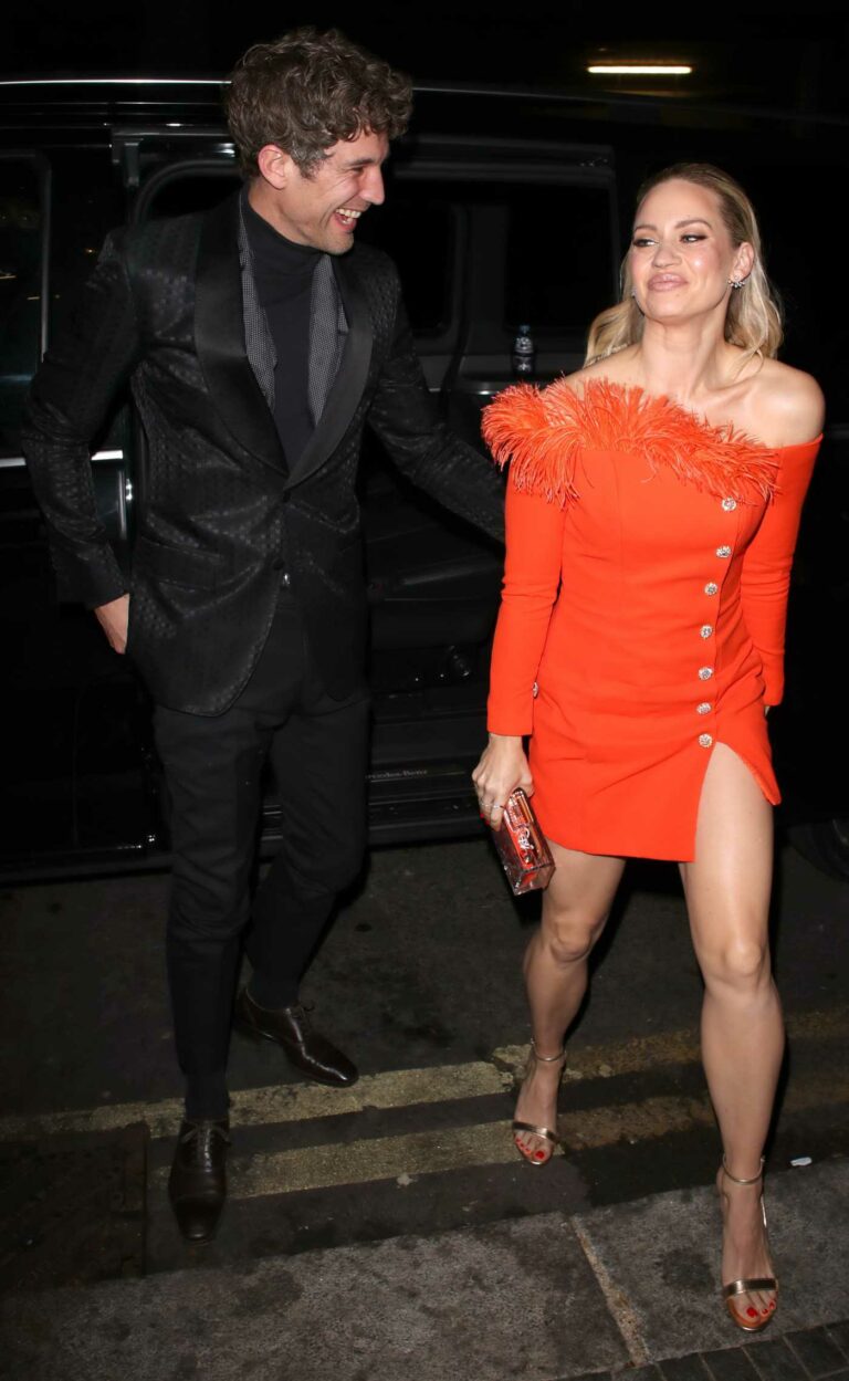 Kimberly Wyatt in an Orange Dress