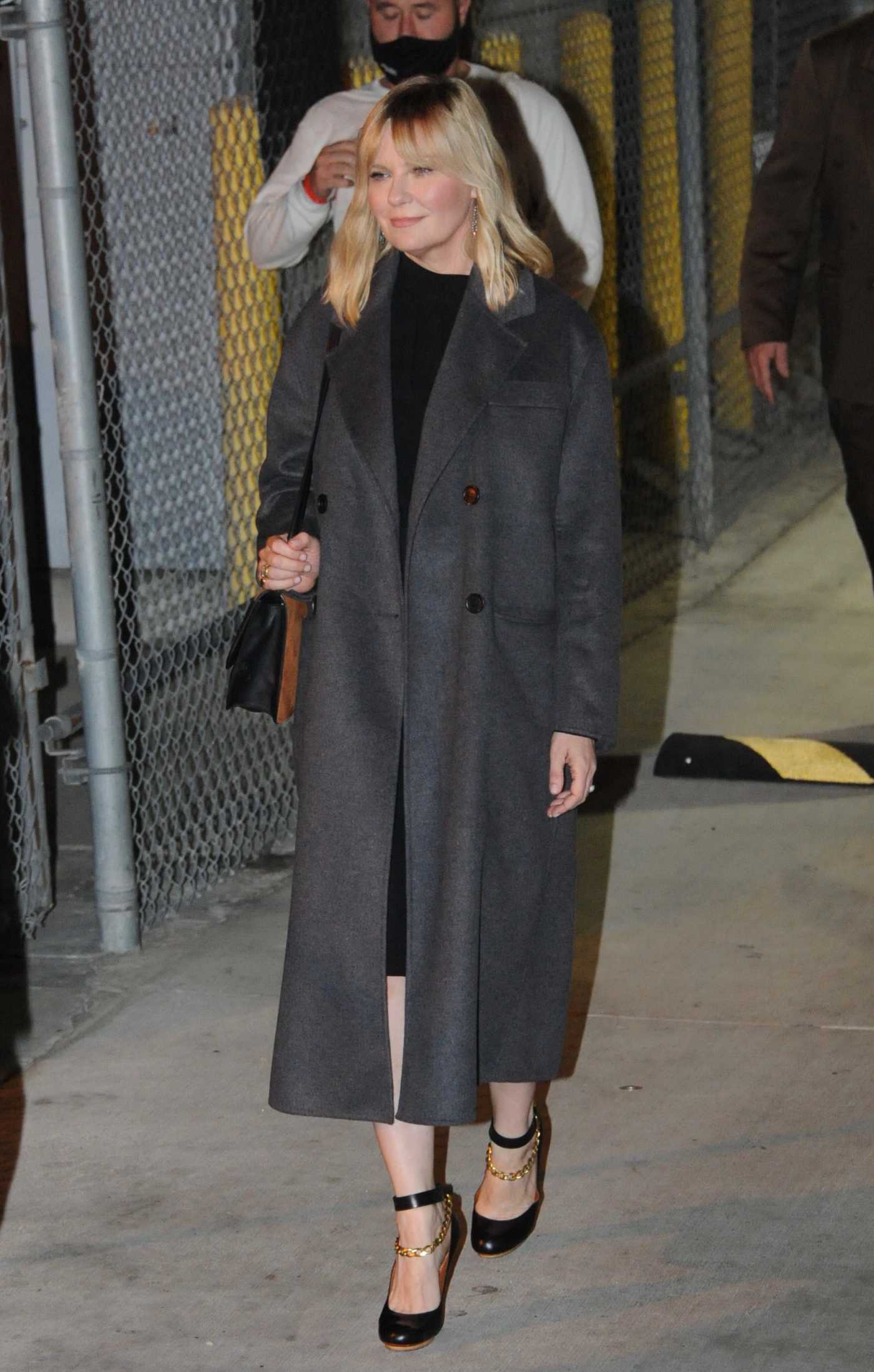 Kirsten Dunst in a Grey Coat Leaves Jimmy Kimmel Live in Los Angeles 11/16/2021