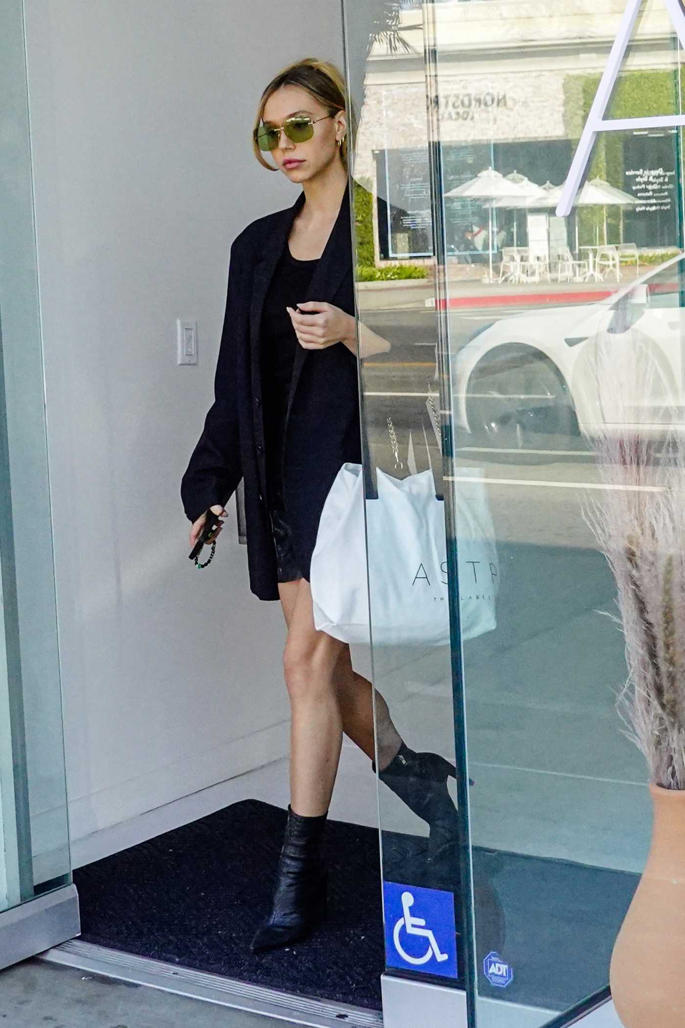 Alexis Ren in a Black Blazer Does Her Holiday Shopping at ASTR The Label on Melrose in Los Angeles 12/09/2021