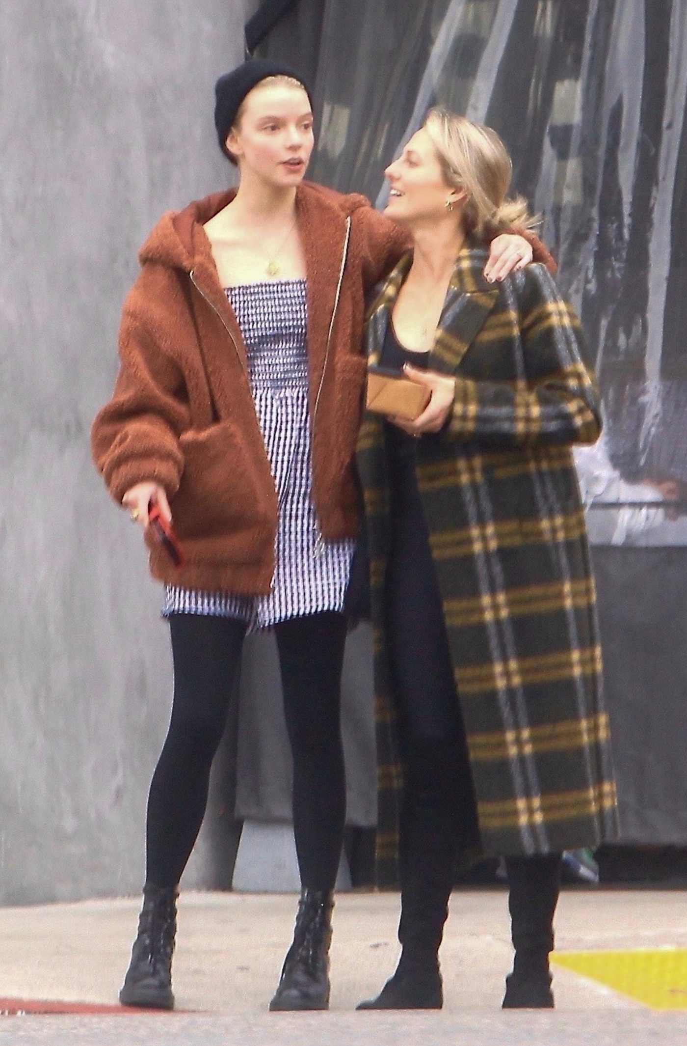 Anya Taylor-Joy in a Black Beanie Hat Was Spotted with a Friend in West Hollywood 12/13/2021