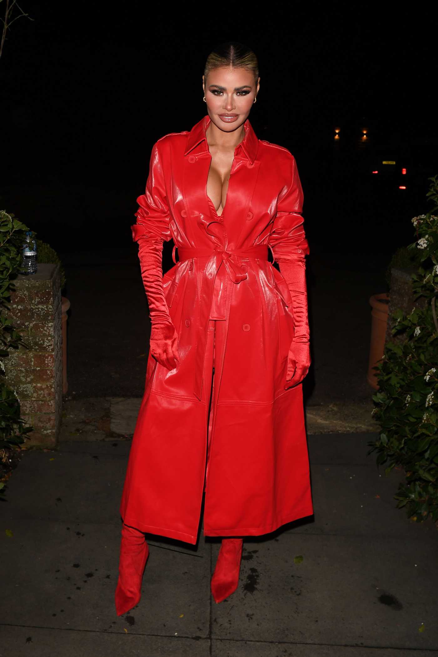 Chloe Sims in a Red Coat Attends The Only Way is Essex TV Show Christmas Special Filming in Essex 12/12/2021