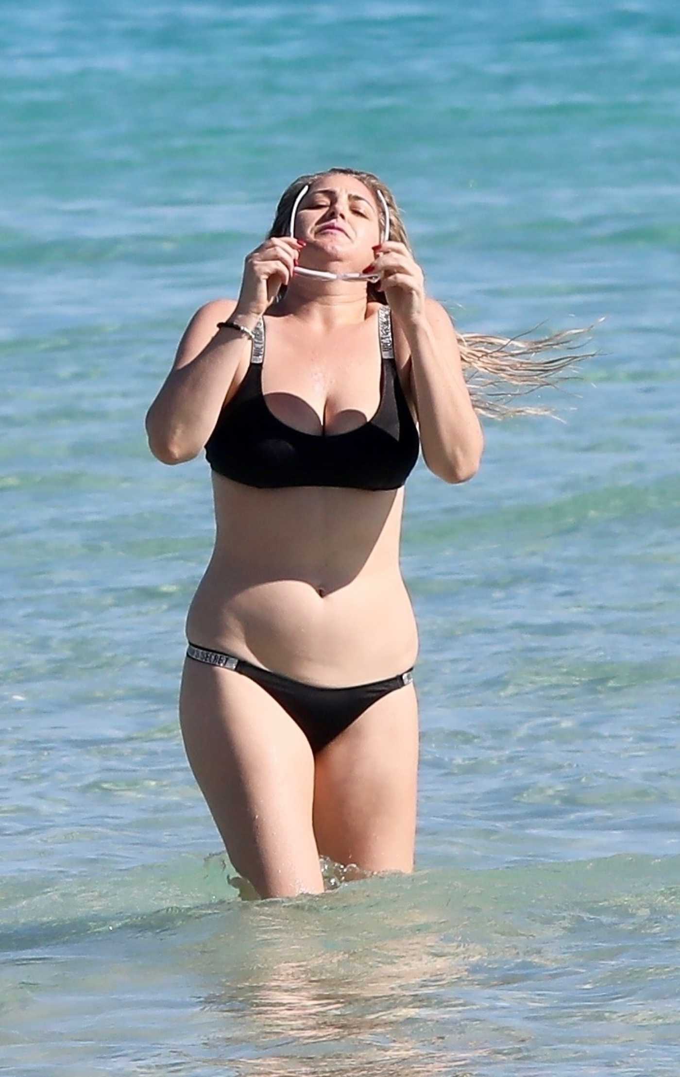 Josie Goldberg in a Black Bikini on the Beach in Miami 12/27/2021