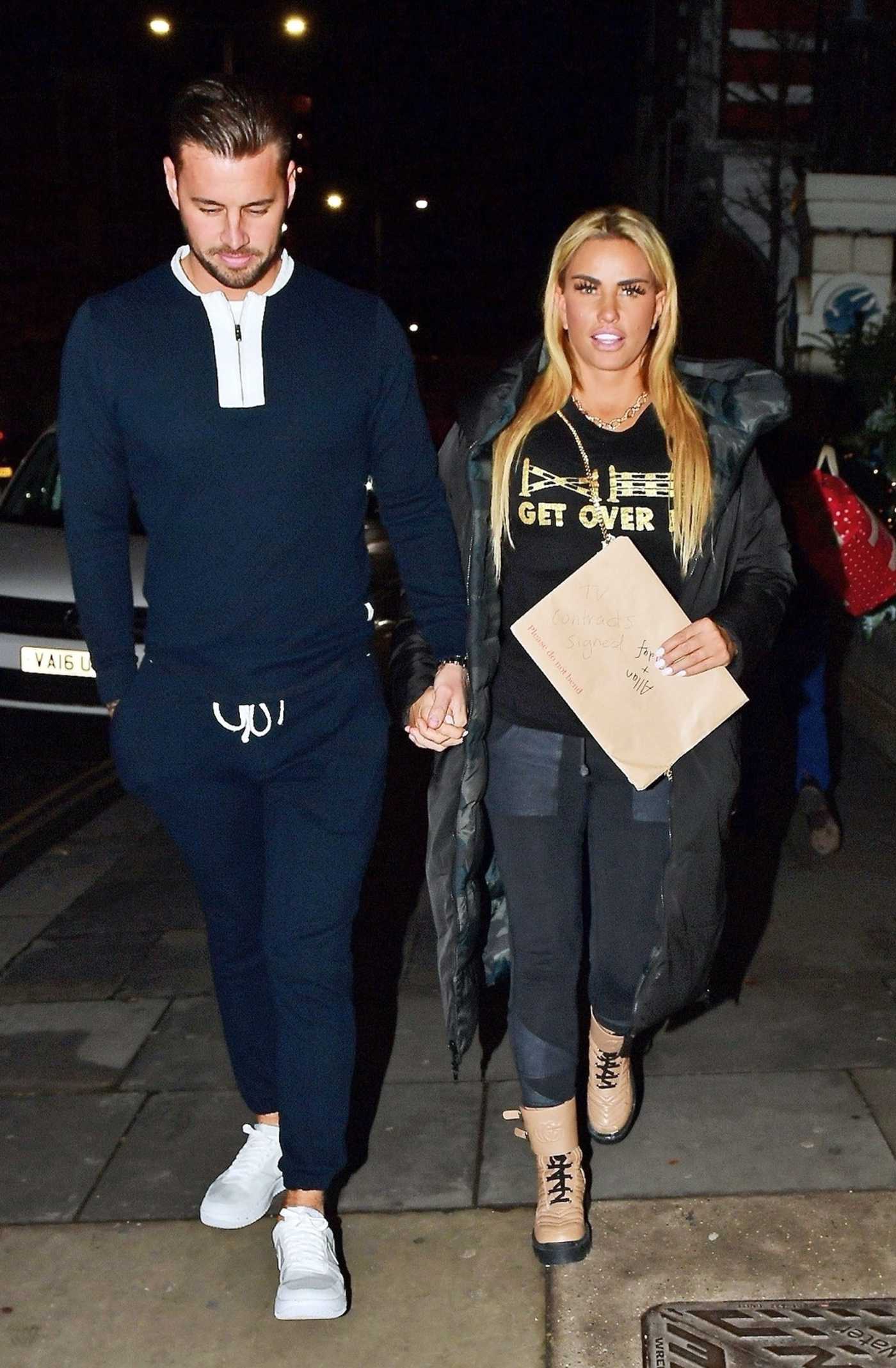 Katie Price in a Black Puffer Coat Was Seen Out with her Fiance Carl Woods in London 12/13/2021