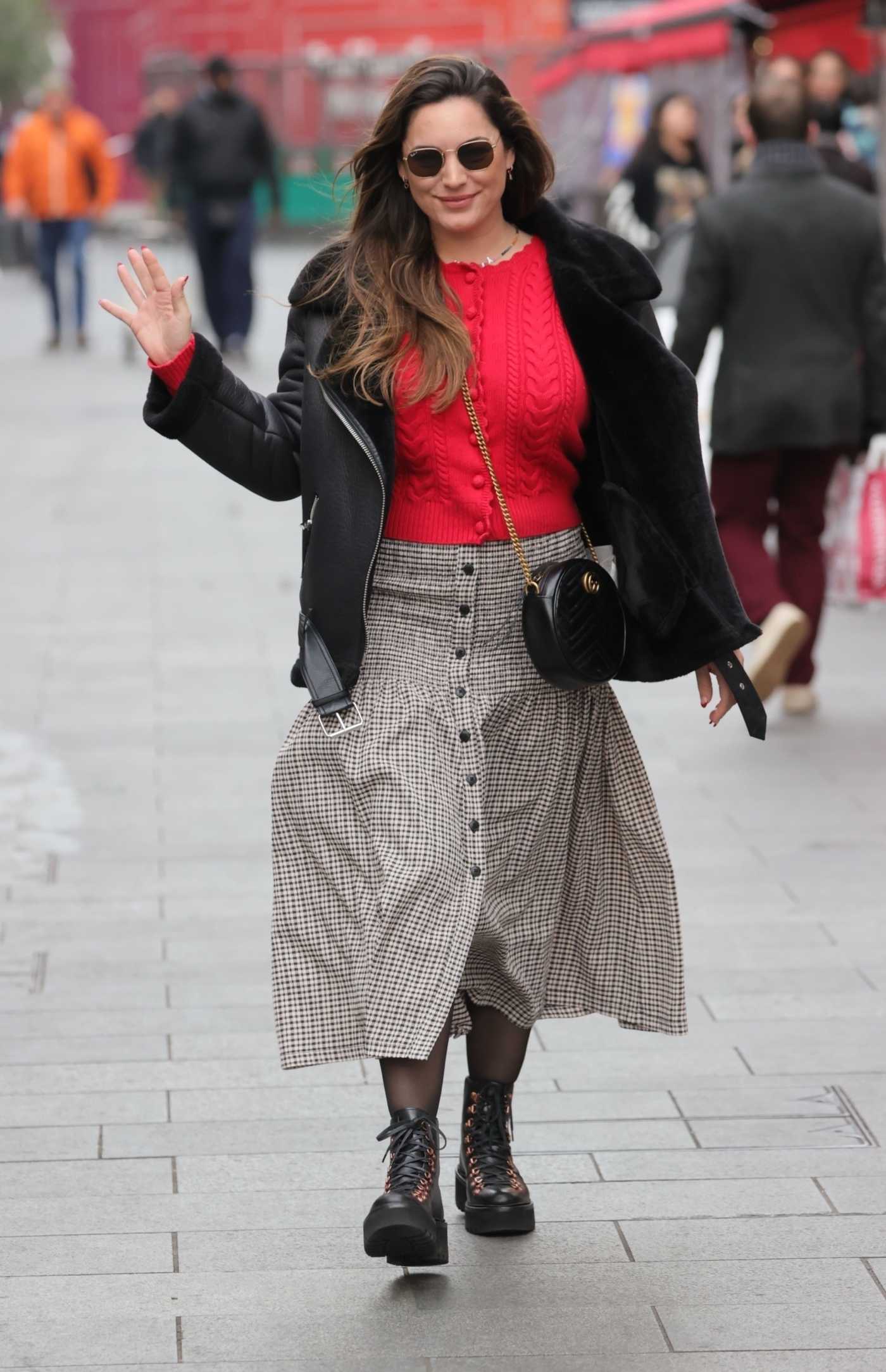 Kelly Brook in a Red Blouse Leaves Her Heart FM Show at the Global Radio Studios in London 12/21/2021