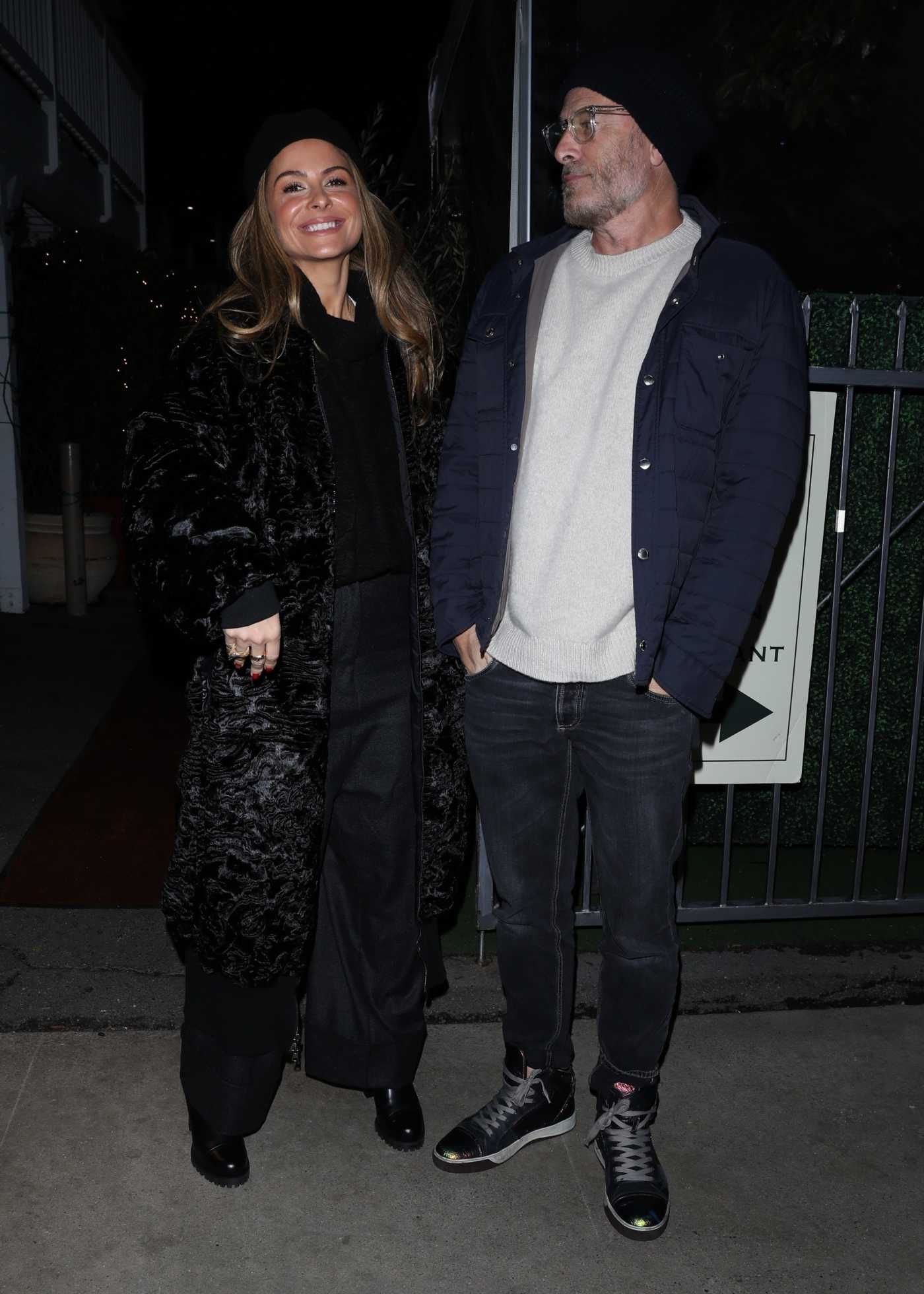 Maria Menounos in a Black Fur Coat Says Her Goodbyes After Dinner with a Male Friend at Giorgio Baldi in Santa Monica 12/15/2021