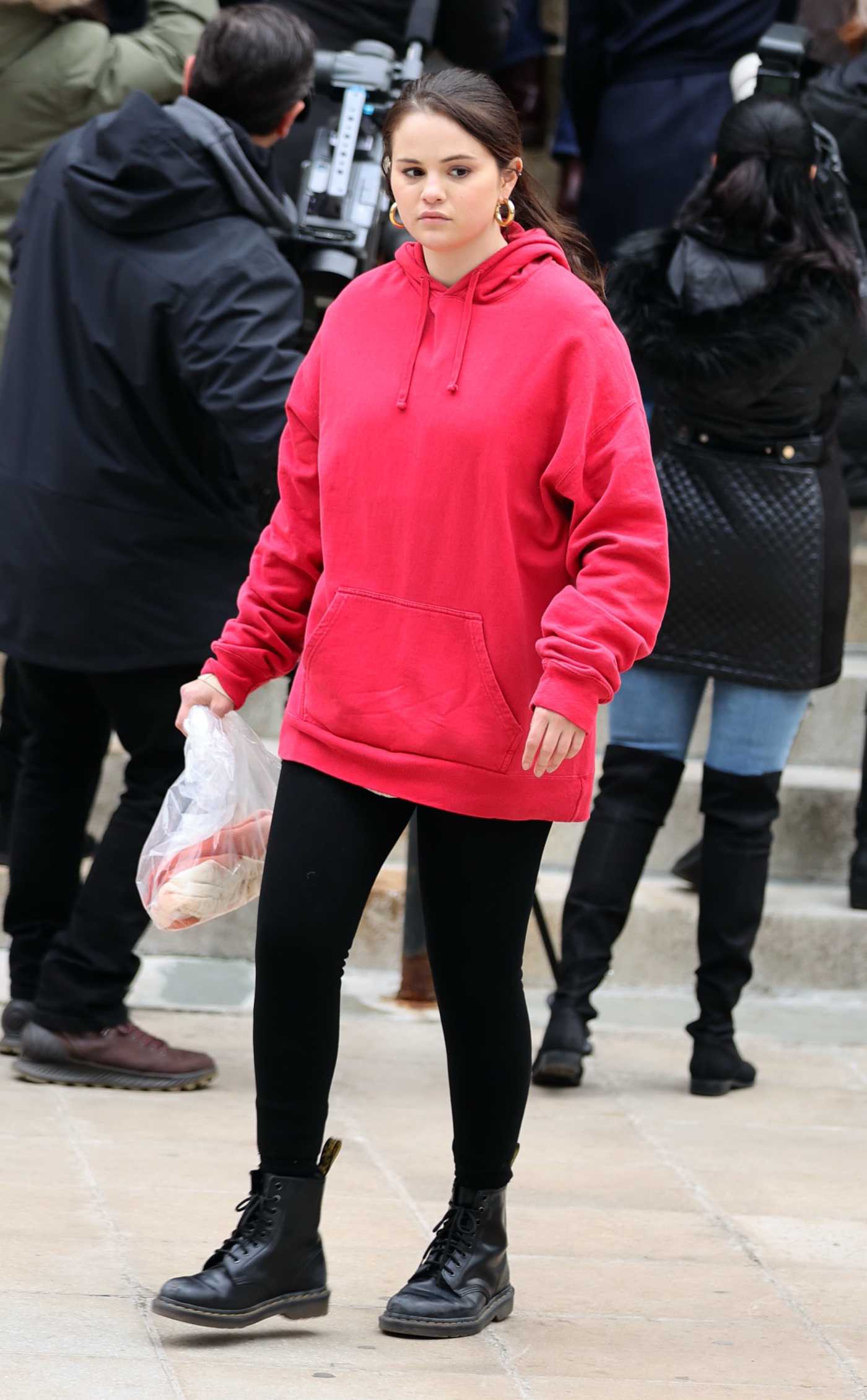 Selena Gomez in a Red Hoodie on the Set of Only Murders in the Building at the Supreme Courthouse in Long Island in New York 12/08/2021
