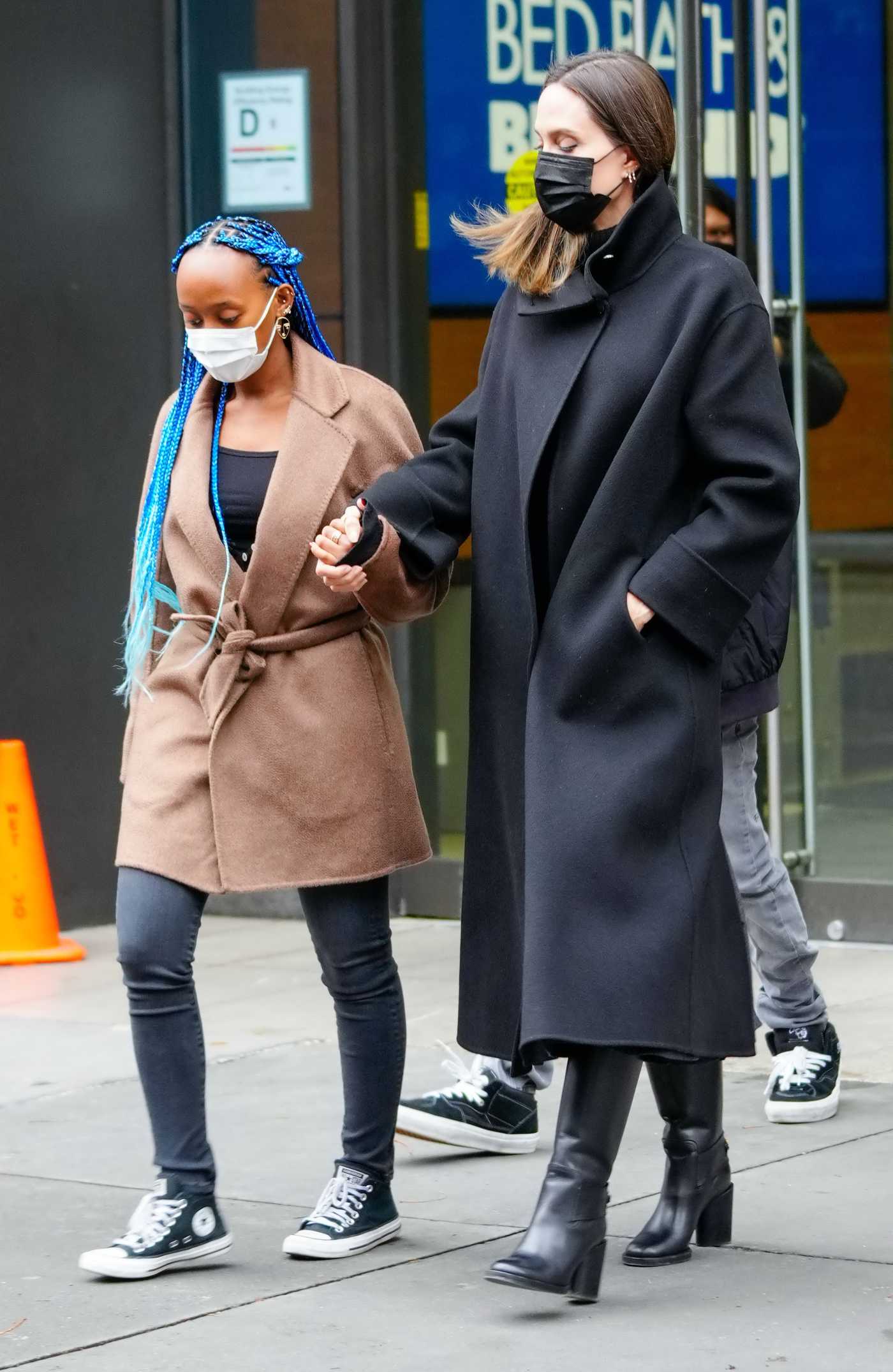 Angelina Jolie in a Black Coat Takes Zahara and Pax Thien Shopping in SoHo in New York 01/17/2022